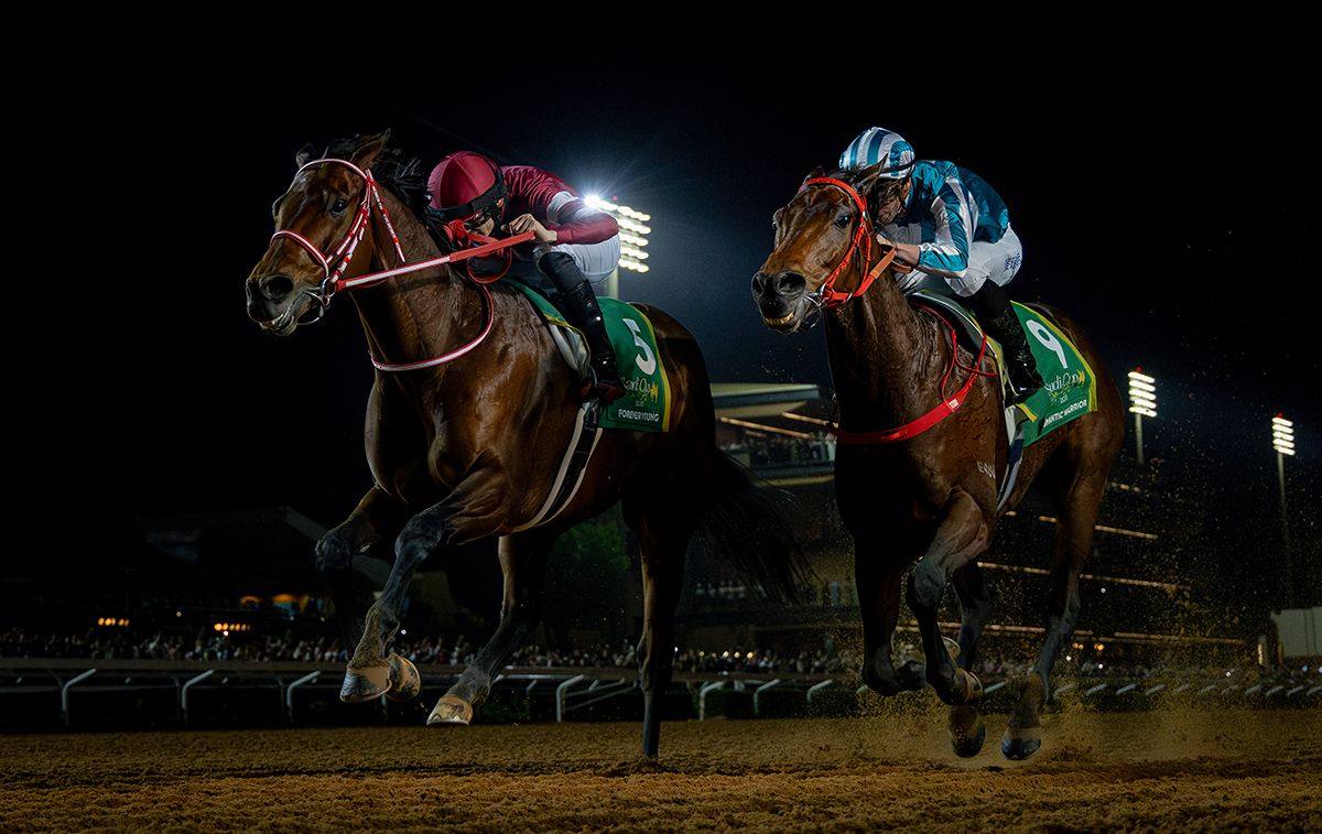 Forever Young narrowly denies Romantic Warrior (inside) in a pulsating finish to the Saudi Cup. Photos: Alex Evers/HKJC