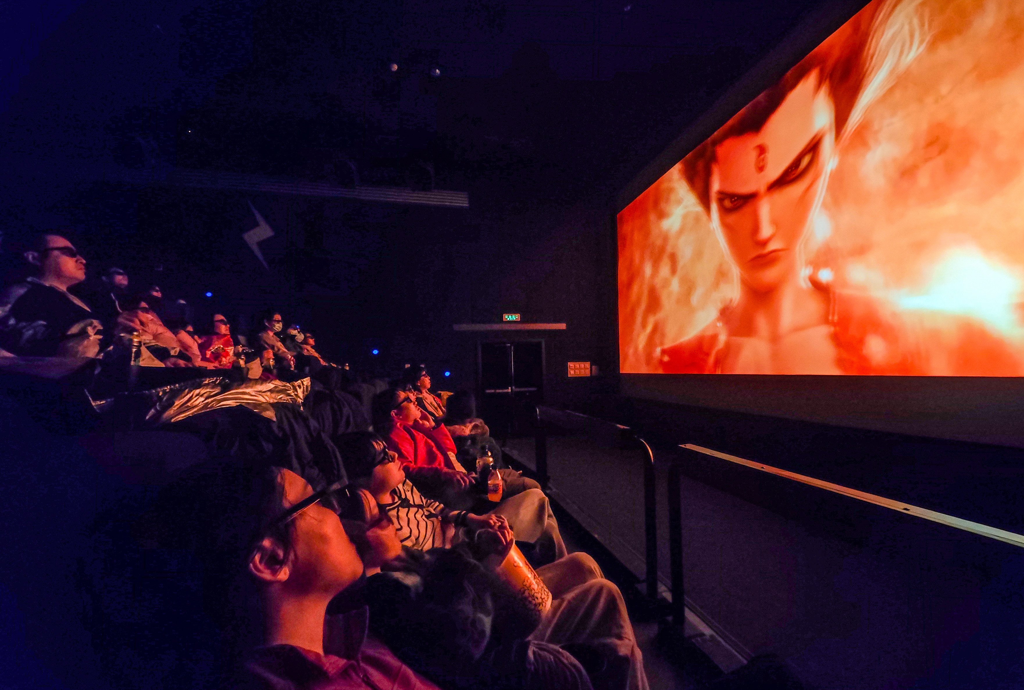 Audience members watch the 4D version of Ne Zha 2 in a cinema in Beijing’s Dongcheng district on February 17. Photo: Xinhua