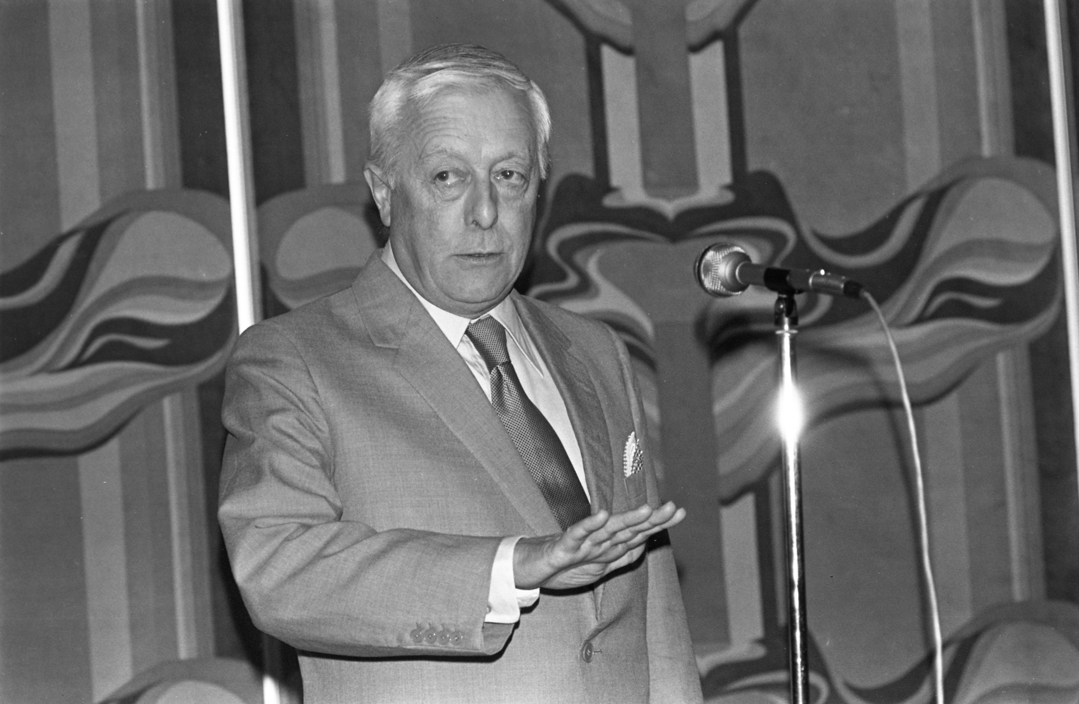 Writer Austin Coates appears on stage in 1977. Photo: SCMP Archives