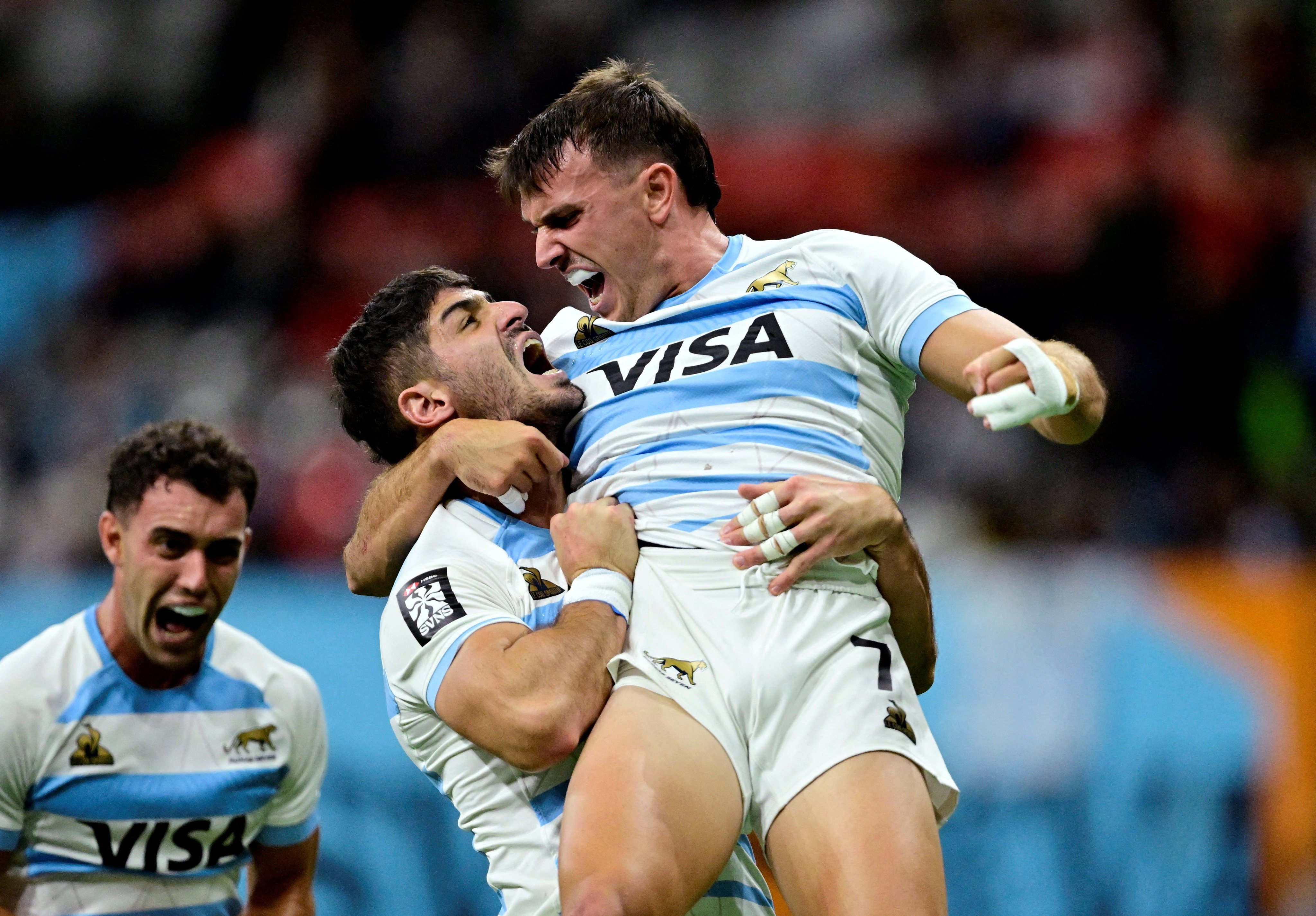 Argentina’s Tobias Wade celebrates with teammates after beating South Africa in the final. Photo: Reuters