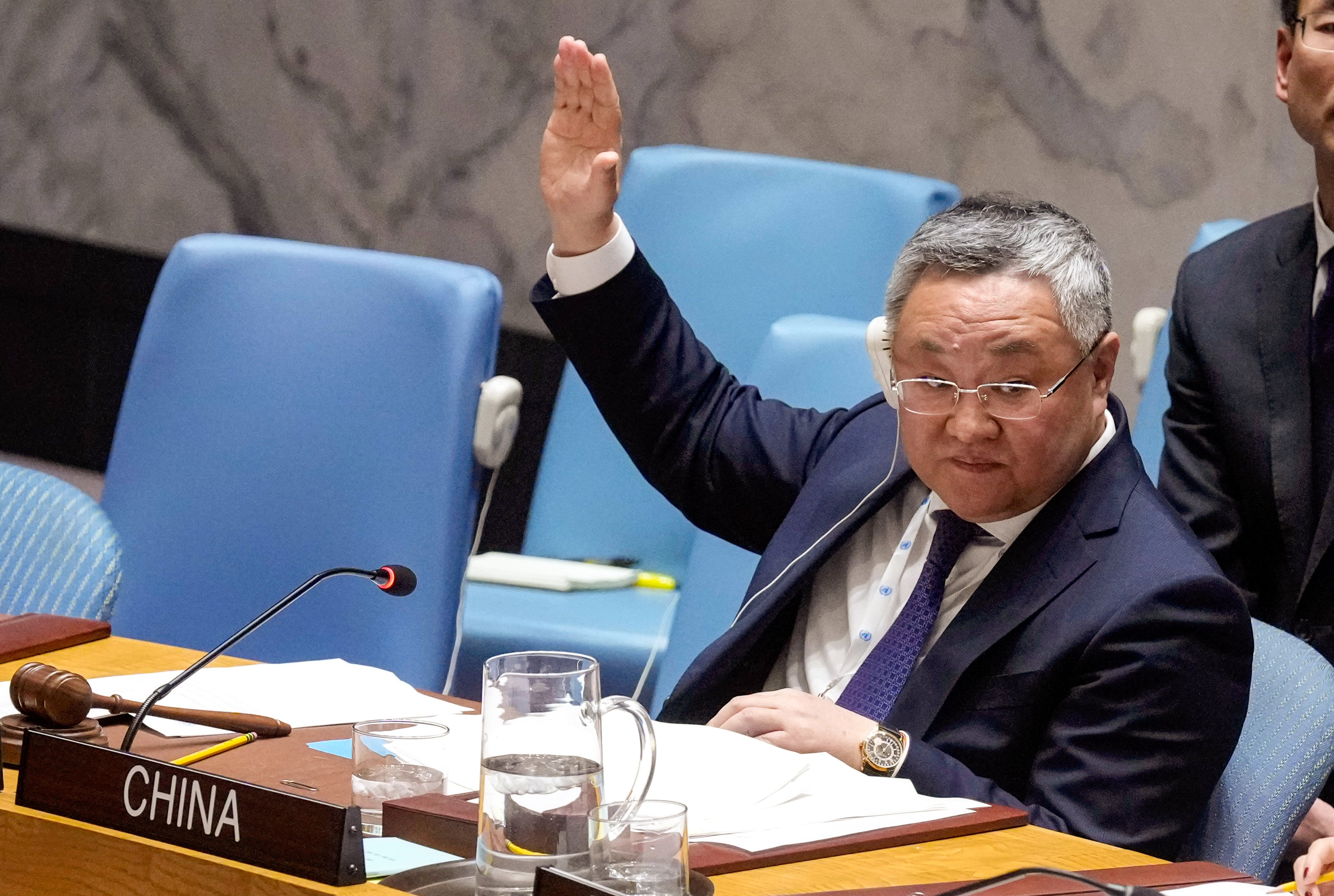 Fu Cong, China’s ambassador to the United Nations, votes in the UN Security Council on Monday at the UN headquarters in New York. Photo: AP 