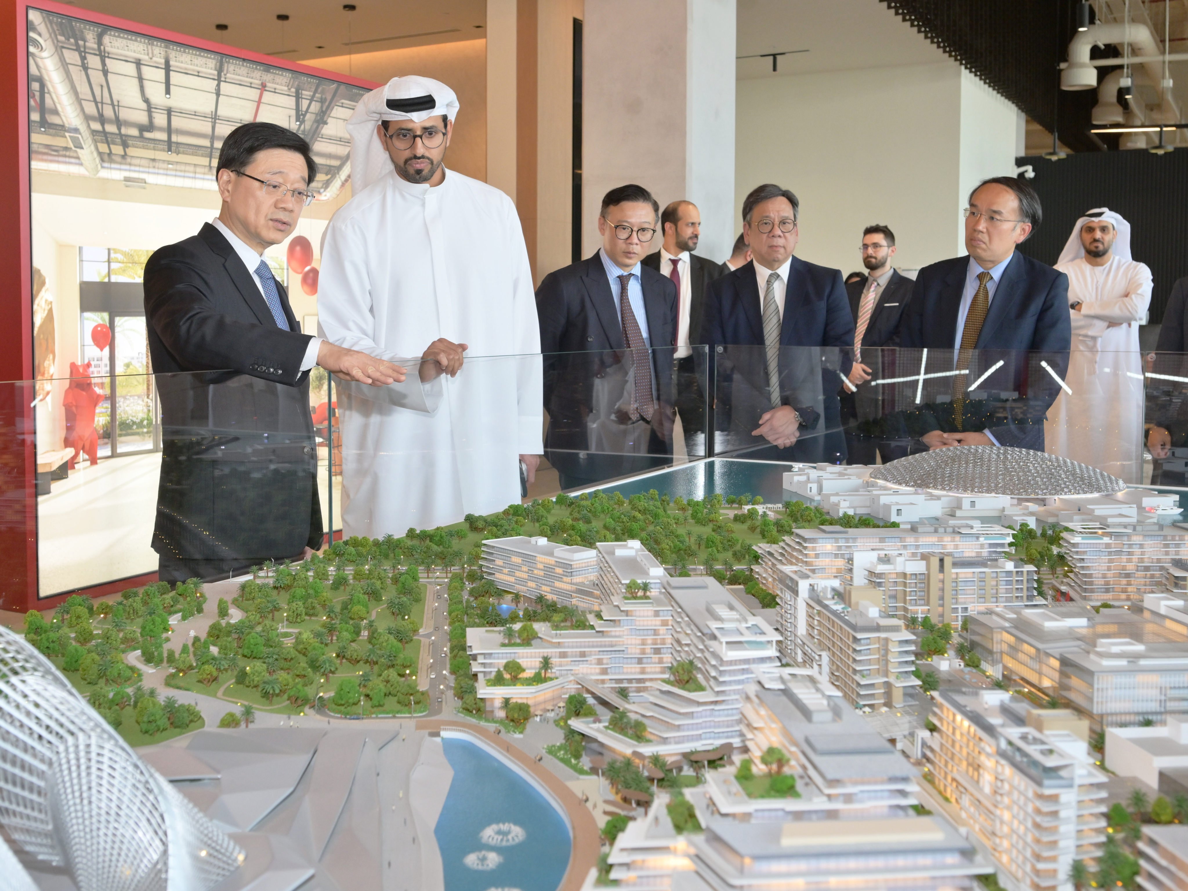 Hong Kong Chief Executive John Lee at a briefing by a representative of Aldar Properties in Abu Dhabi in the United Arab Emirates on February 7, 2023. Photo: ISD/Xinhua