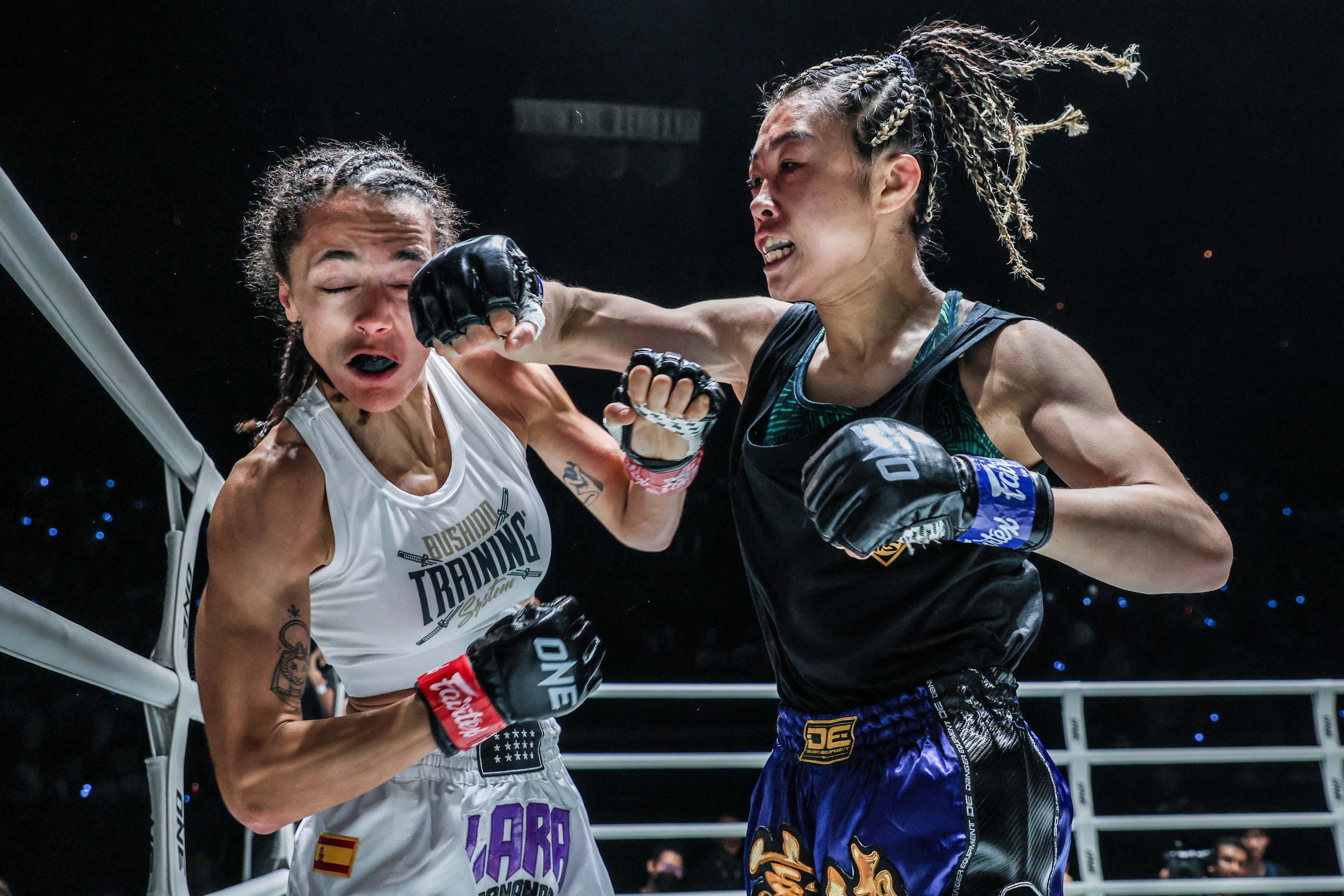 Hong Kong star Yu Yau-pui (right) lands on right hand against Lara Fernandez at ONE Fight Night 20. Photo: ONE Championship