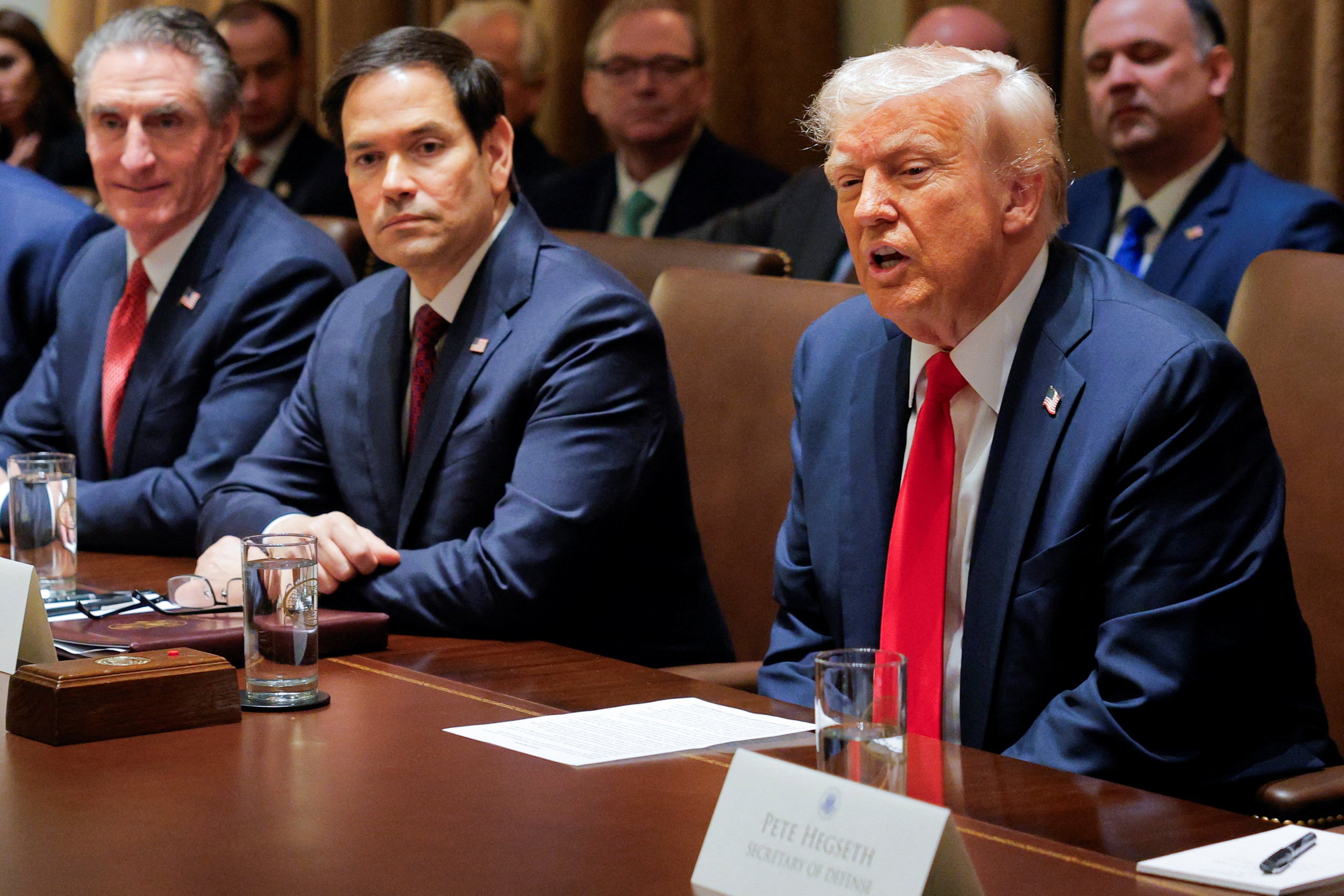 US President Donald Trump, flanked by US Secretary of State Marco Rubio, hosts his administration’s first cabinet meeting in Washington on Wednesday. Photo: Reuters