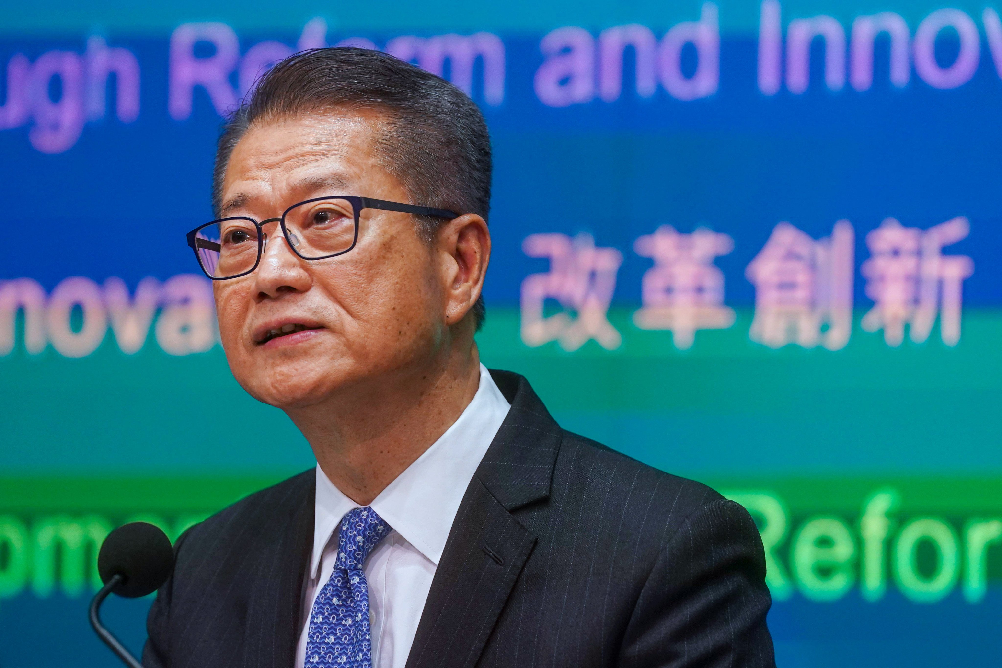 Paul Chan, seen in a press conference about the budget on Thursday, is facing economic headwinds in Hong Kong. Photo: Elson Li