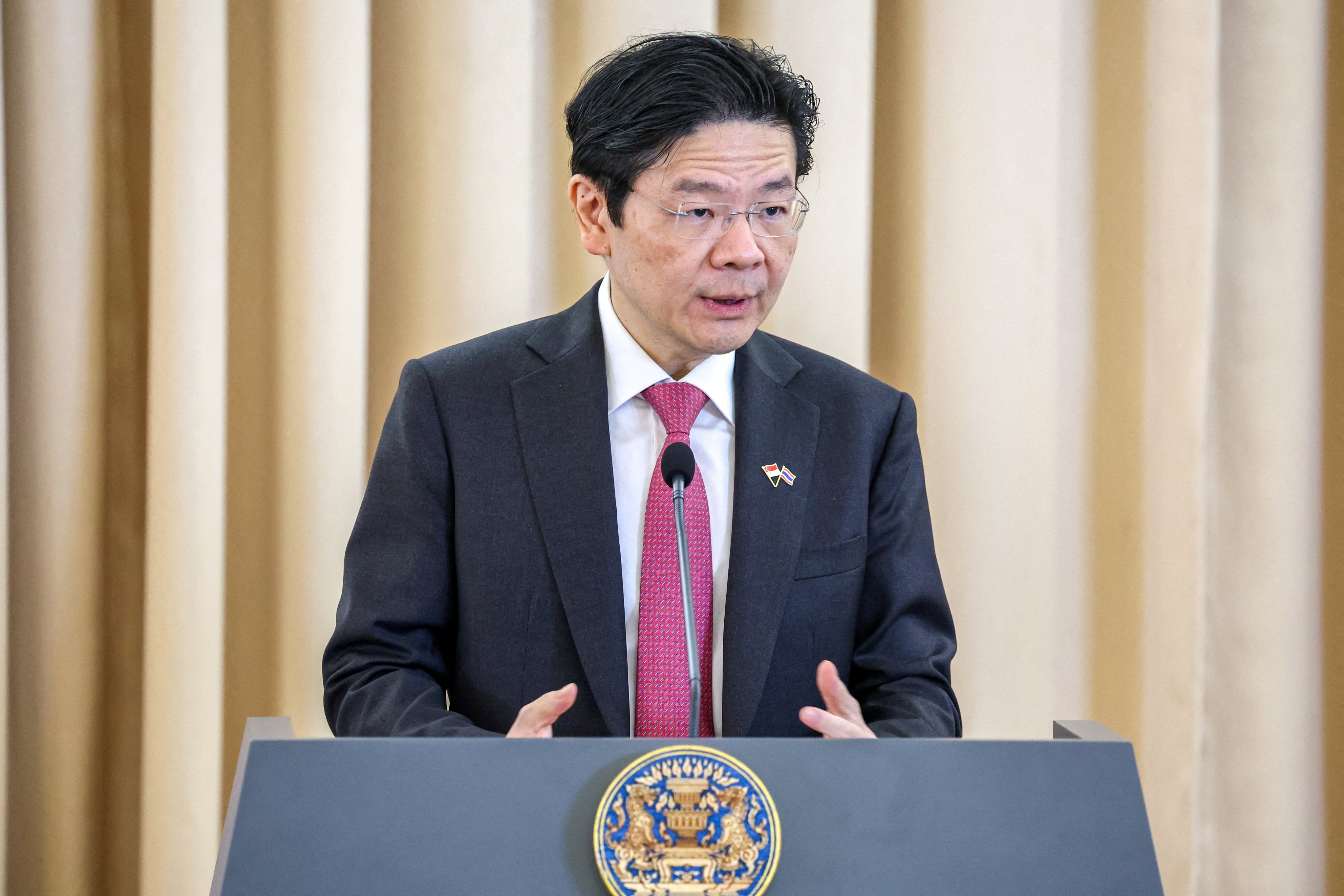 Singapore’s Prime Minister Lawrence Wong speaks at a press conference in Bangkok last November. Photo: Reuters