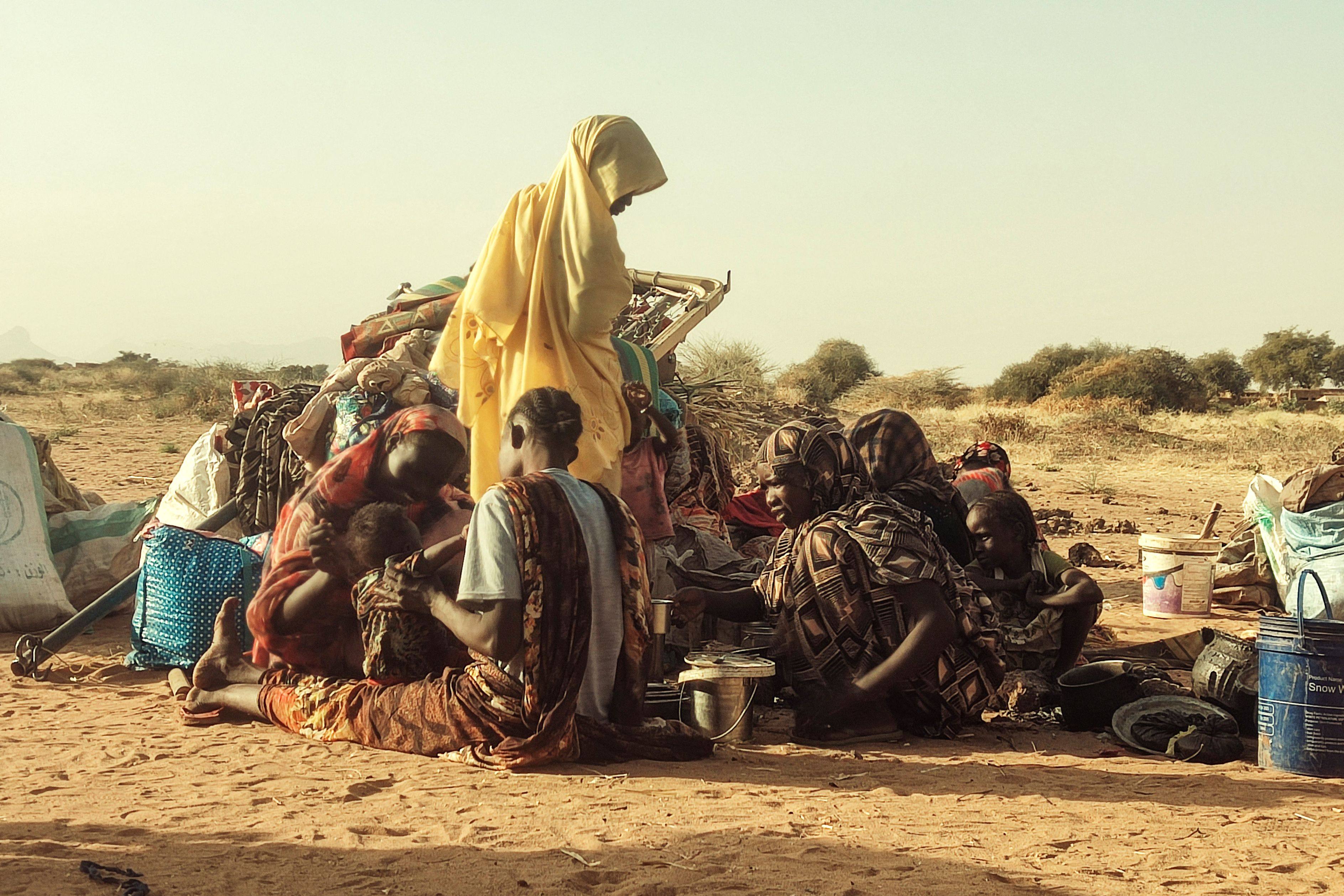 Displaced Sudanese, who fled the Zamzam camp, gather near the town of Tawila in North Darfur on February 14. Photo: AFP