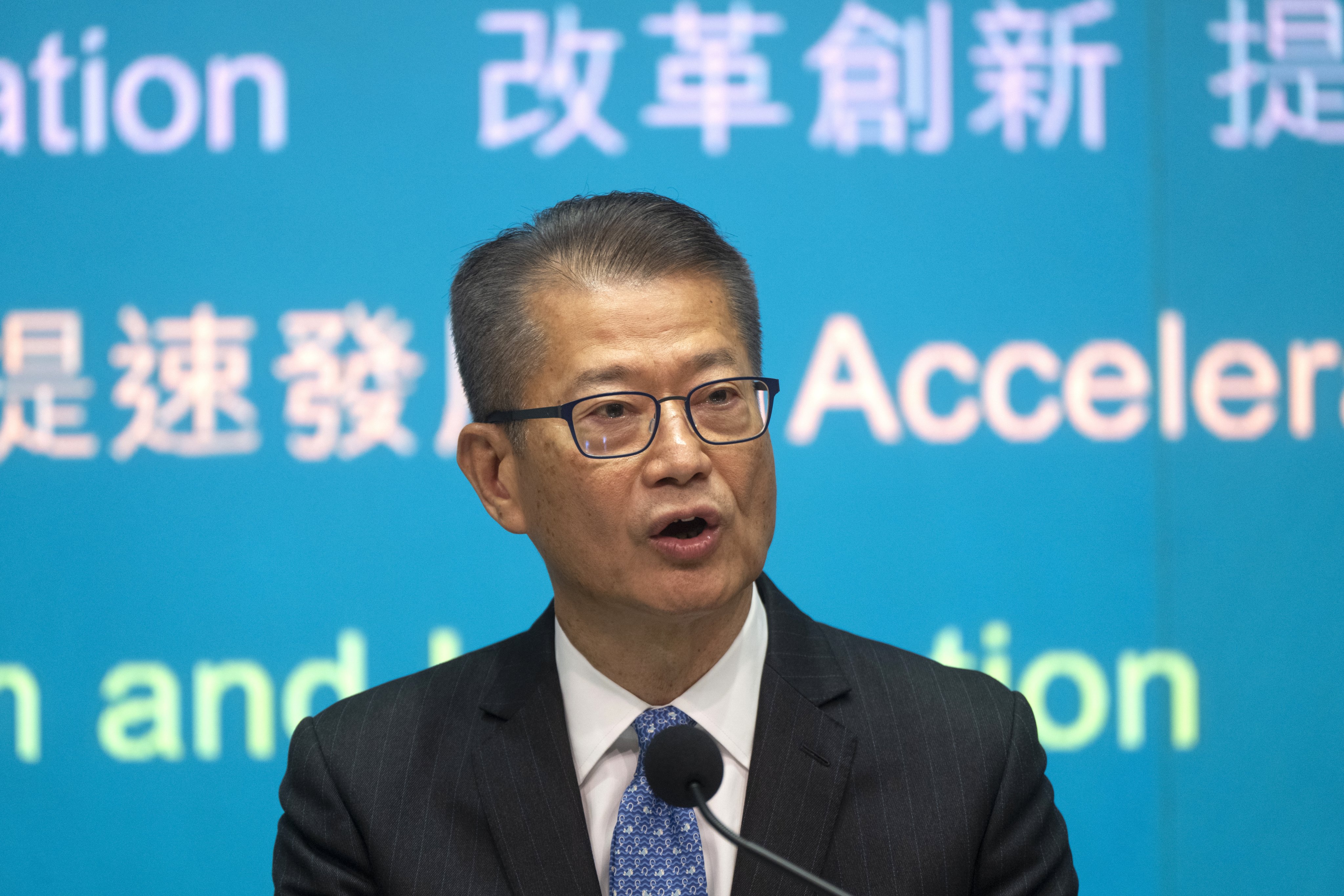 Hong Kong Financial Secretary Paul Chan speaks at a press conference after presenting the budget for 2025-26. Photo: EPA-EFE