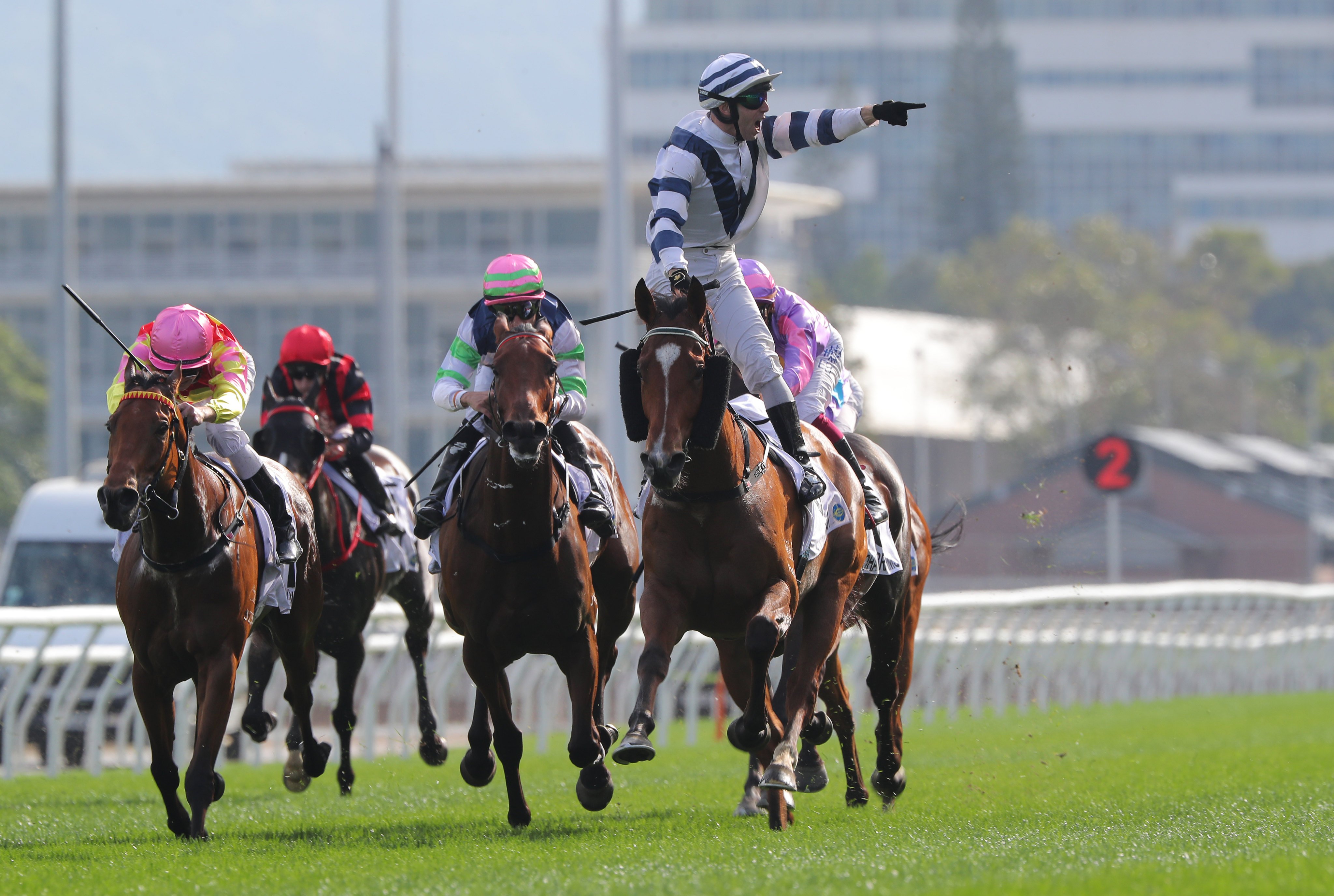 Brenton Avdulla points to the crowd after winning the Classic Cup (1,800m) aboard Rubylot. Photos: Kenneth Chan