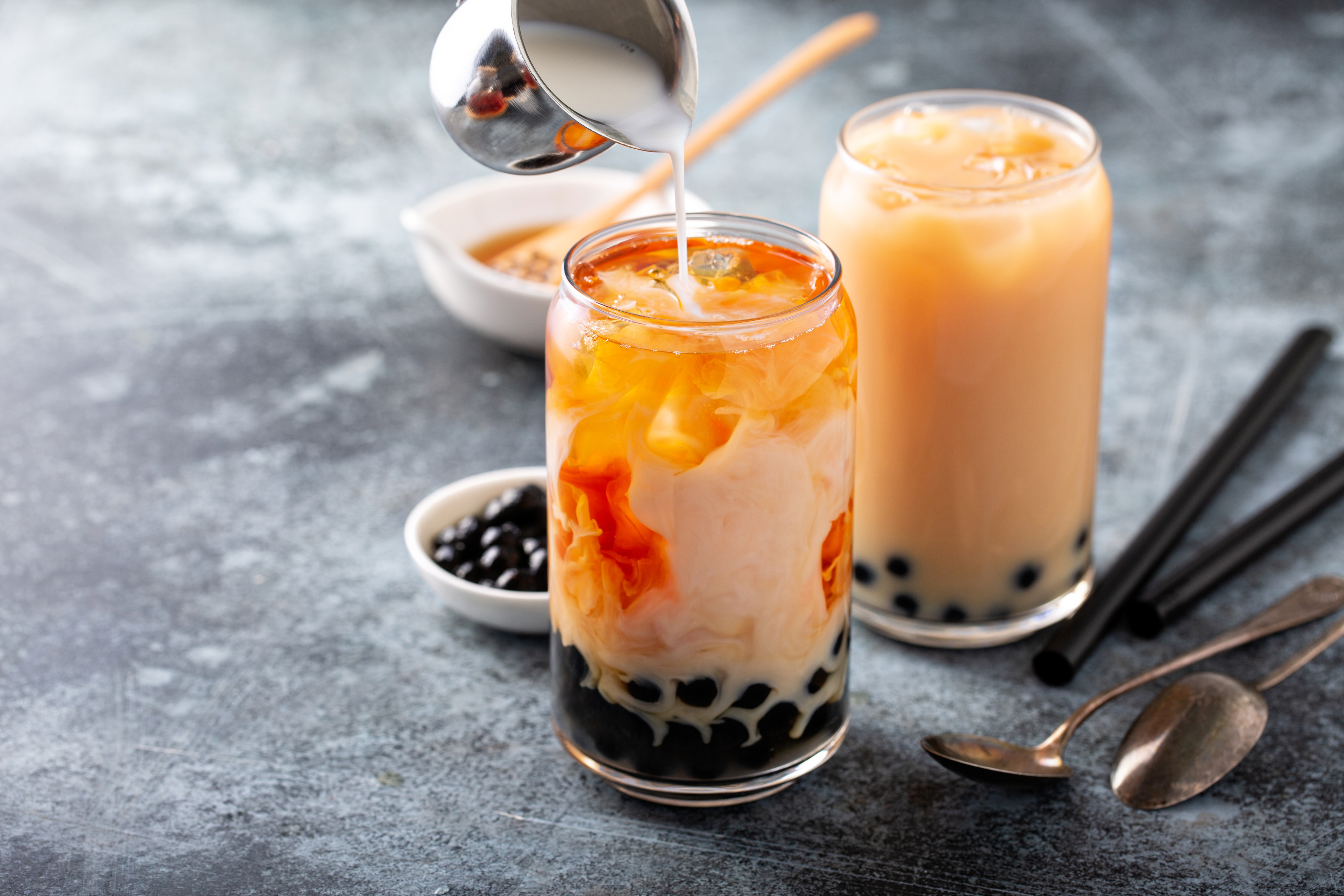 Bubble tea is a deliciously unique drink that combines flavourful tea with chewy tapioca pearls, offering a delightful taste and texture experience. Photo: Shutterstock