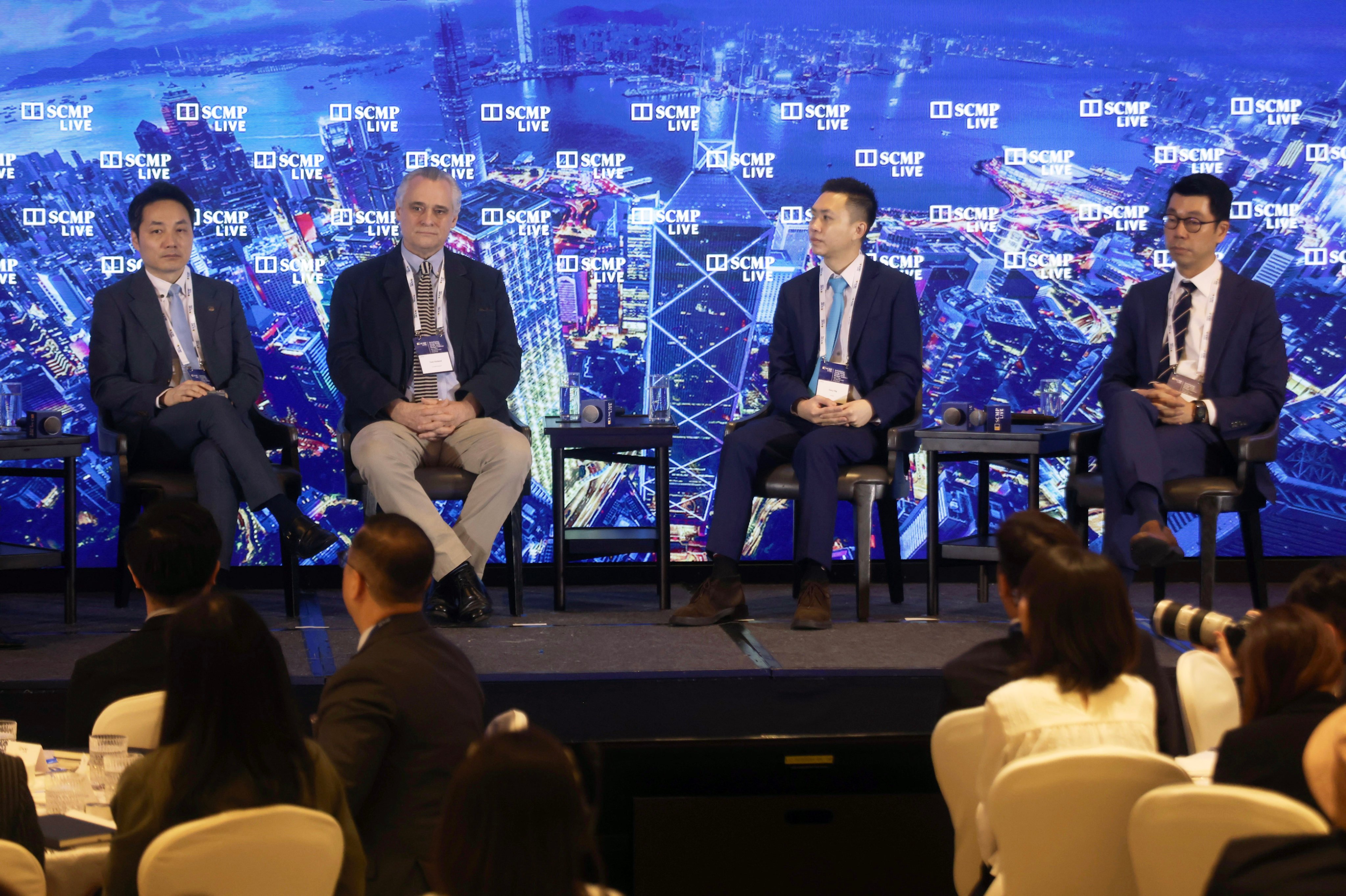 (From left) Edward Au, Tom Holland, Gary Ng and Heiwai Tang take part in the panel discussion. Photo: Jonathan Wong