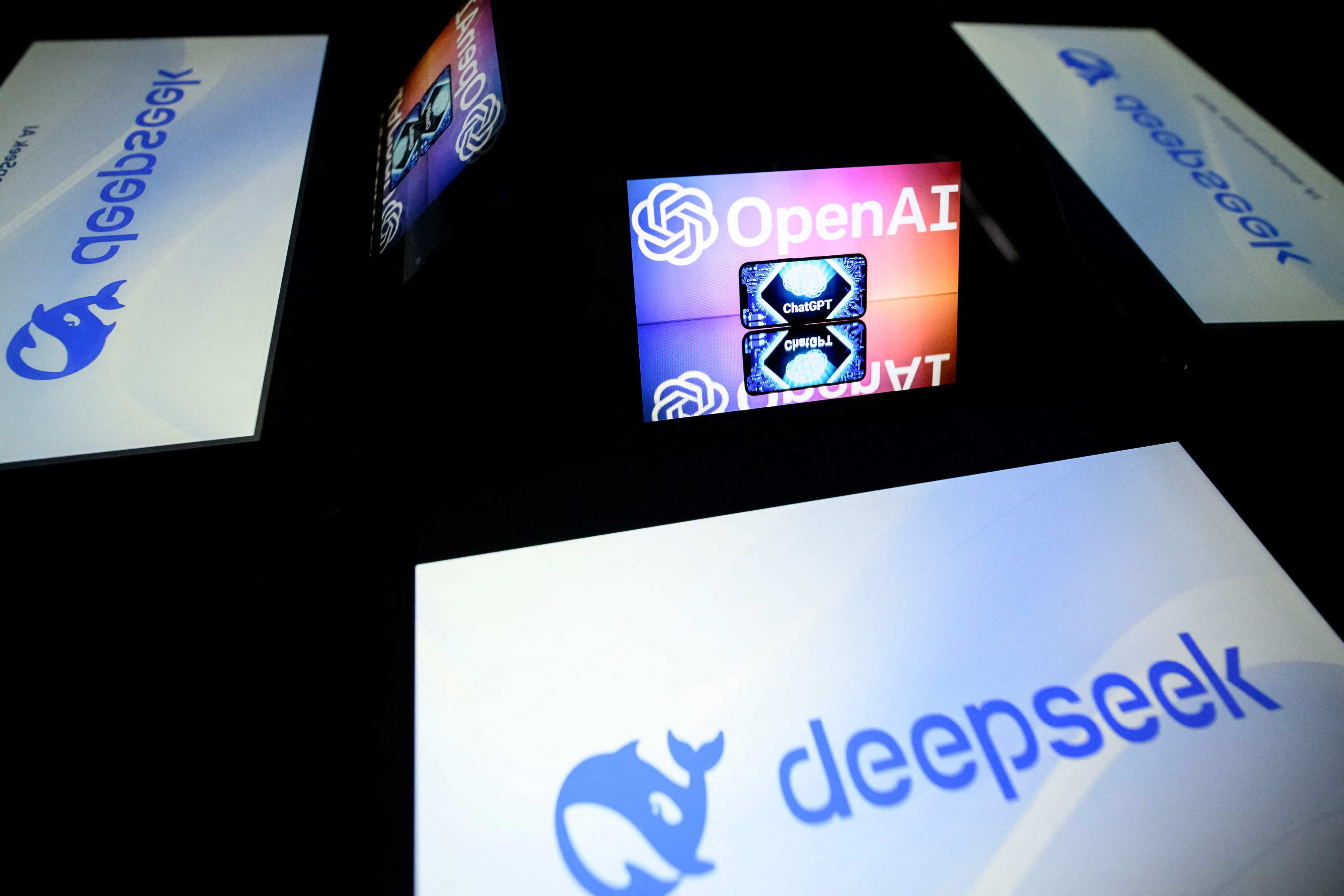 This illustration photograph taken January 29, 2025 shows screens displaying the logos of DeepSeek and OpenAI. Photo: AFP