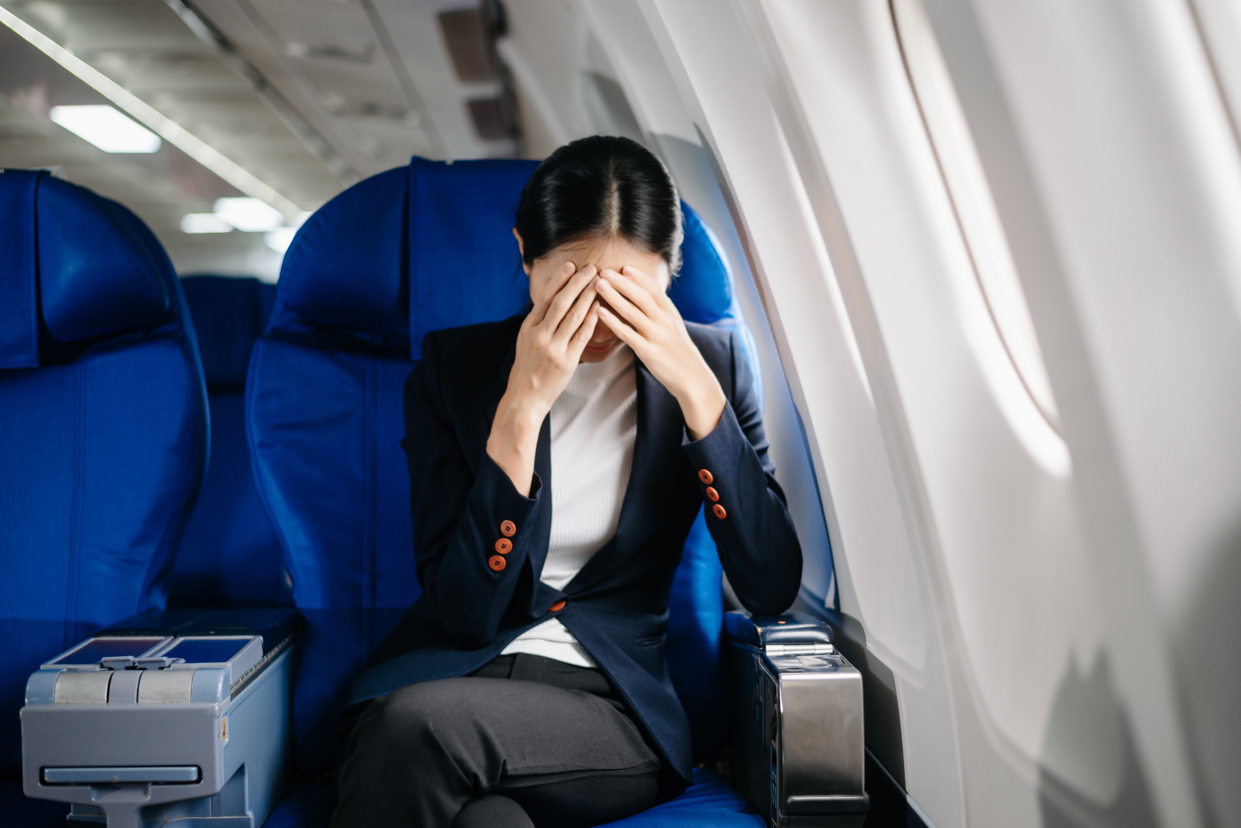 When you are worrying about a mid-air plane crash, how do you keep calm on a flight? Five tips for how to stop feeling anxious. Photo: Getty Images