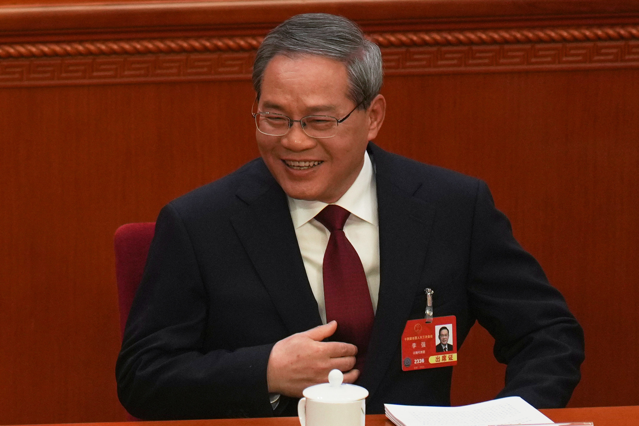 Premier Li Qiang delivers a speech during the opening session of the National People’s Congress on Wednesday. Premier Li mentioned the need to tackle “neijuan” for the first time during his annual work report. Photo: Reuters