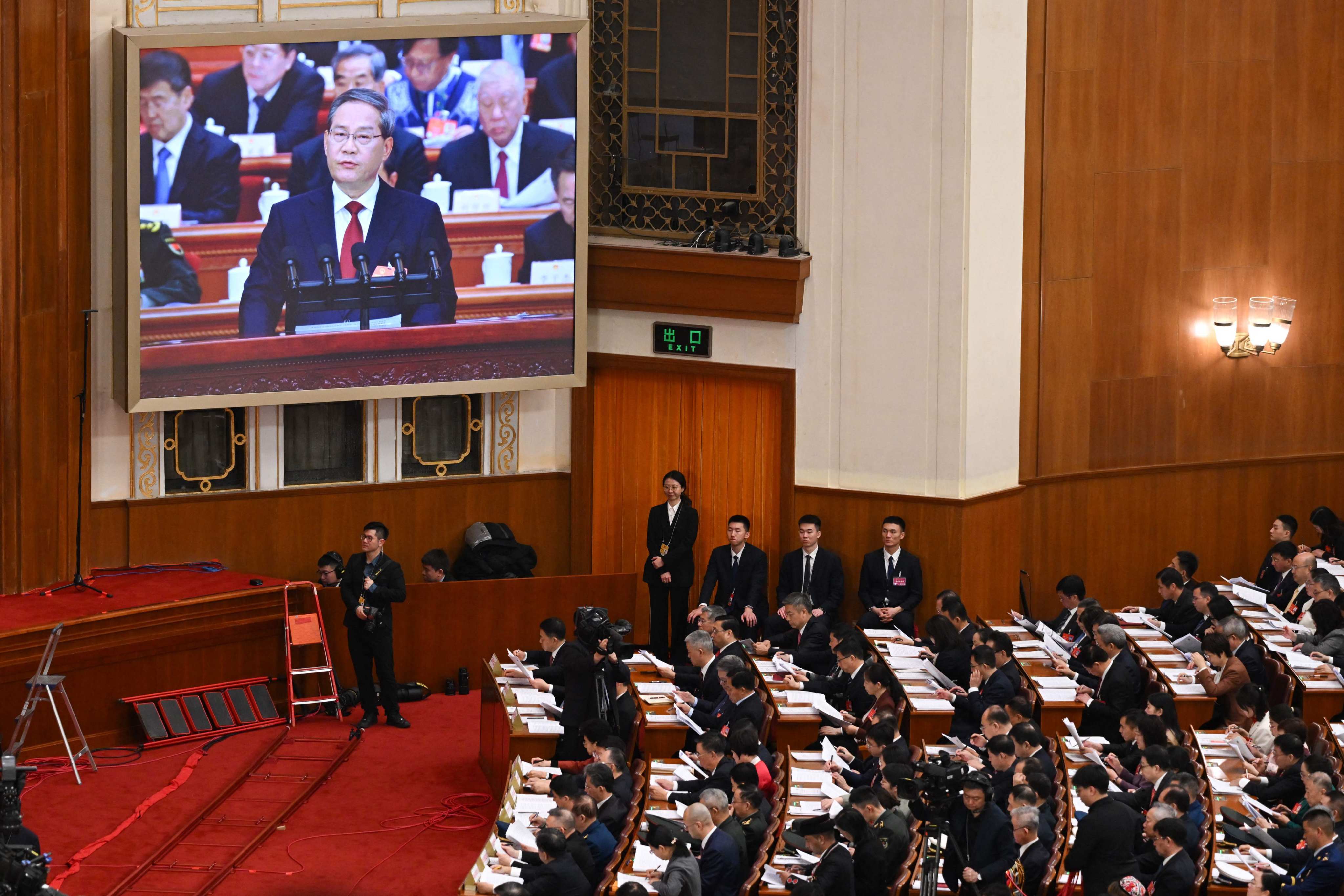 China’s Premier Li Qiang addresses the opening session of the National People’s Congress at the Great Hall of the People in Beijing. Photo: AFP