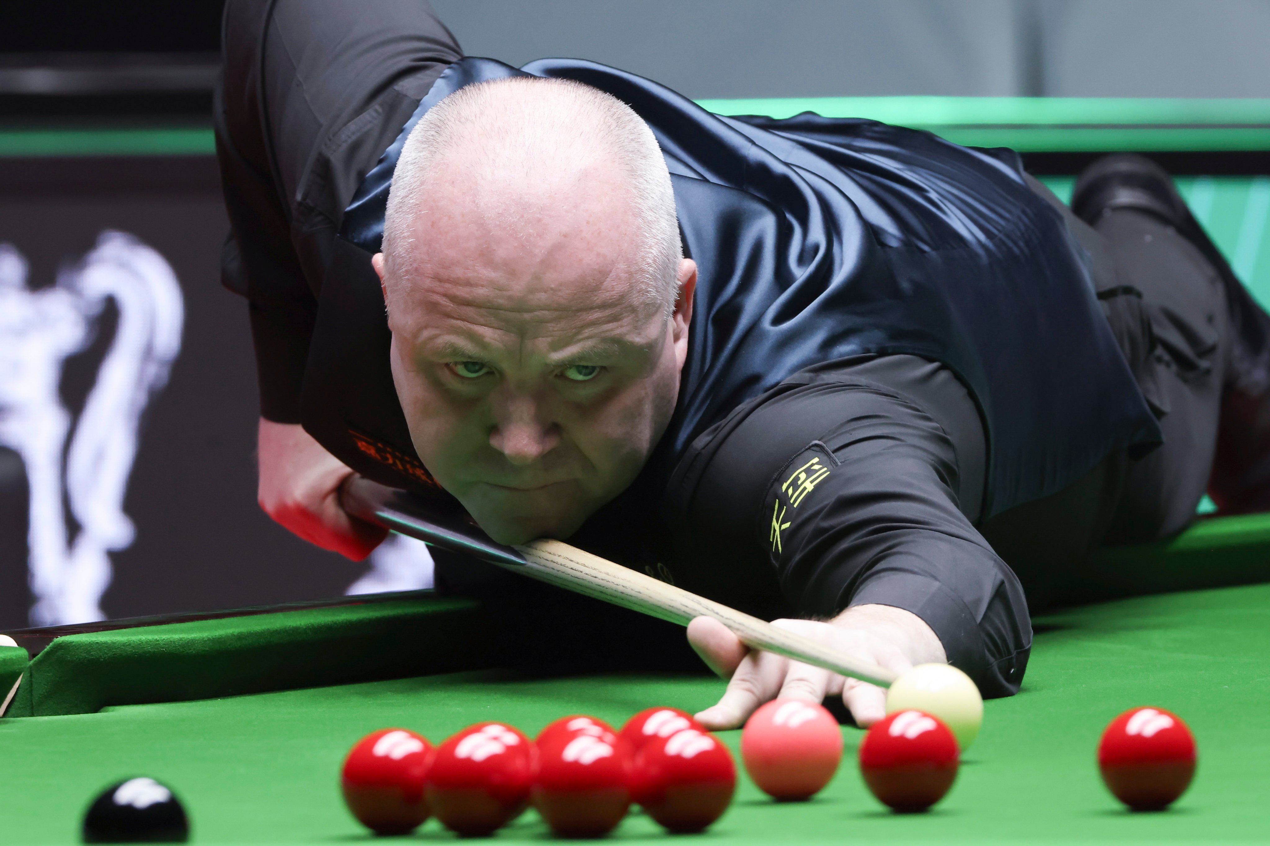 John Higgins compiled a tournament-high 143 break during his World Grand Prix second-round victory over Kyren Wilson. Photo: Jonathan Wong