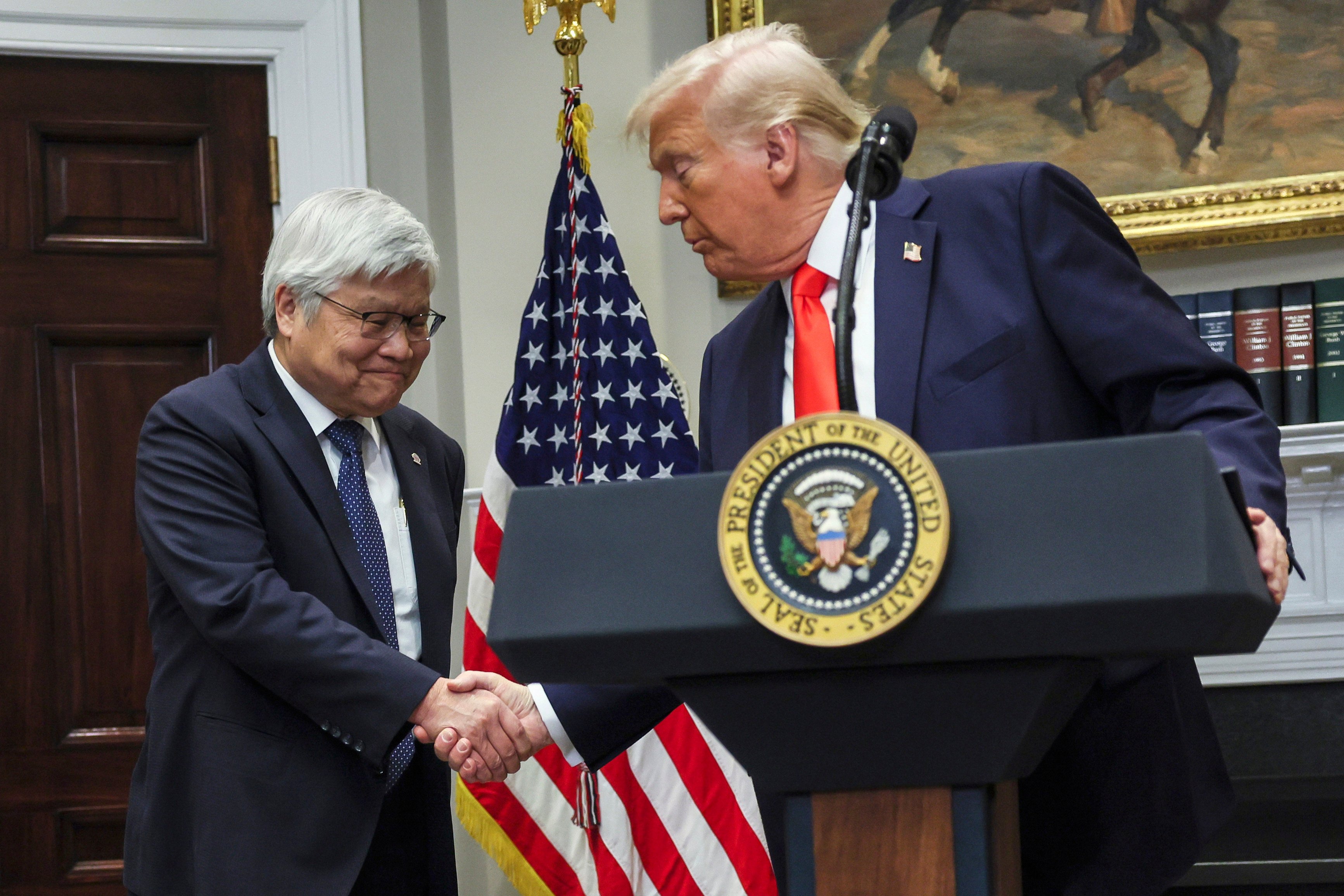 President Donald Trump shakes hands with C.C. Wei, chairman and CEO of Taiwan Semiconductor Manufacturing Co., in the Roosevelt Room of the White House in Washington. Photo: Pool via AP