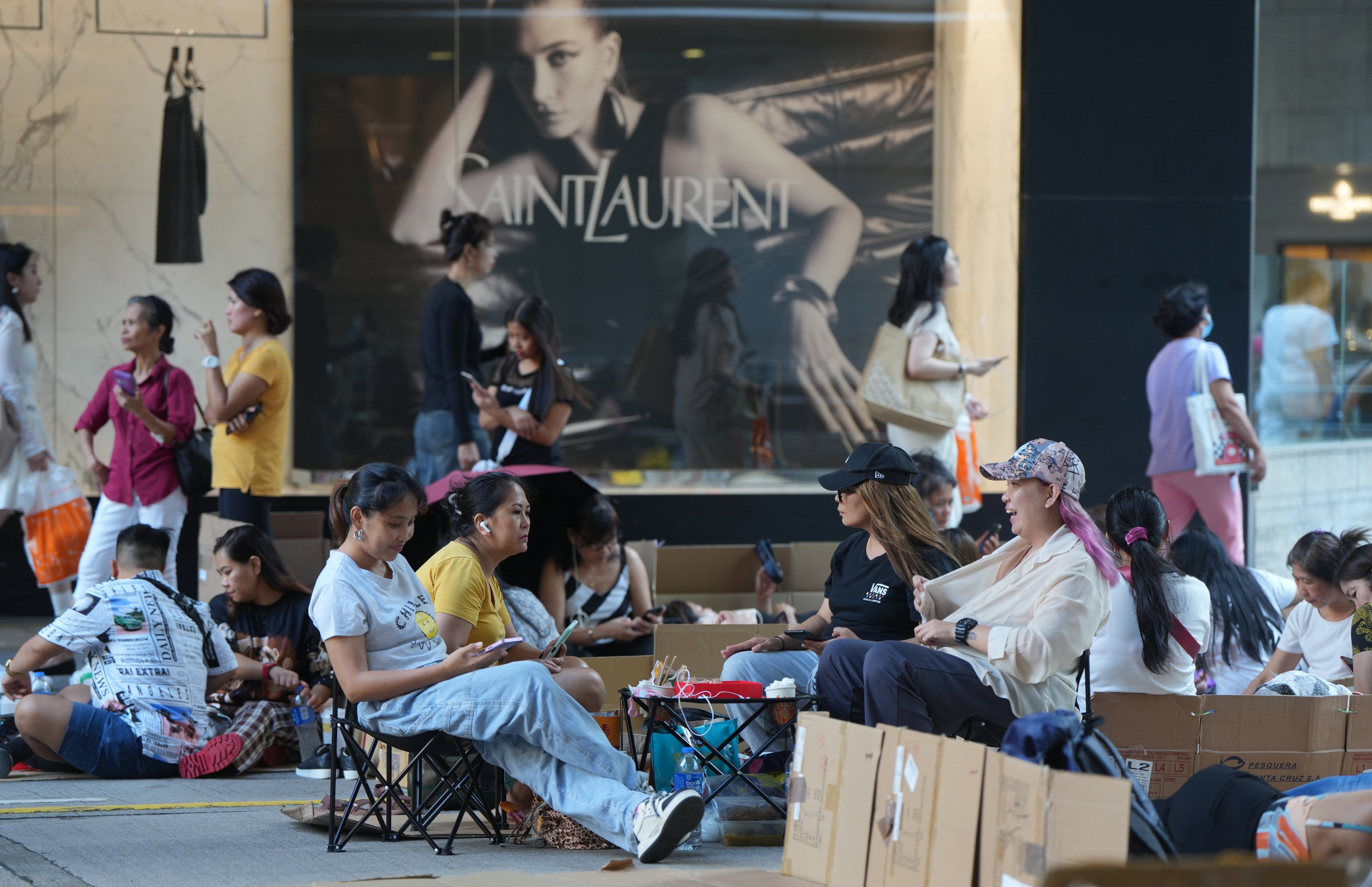 Migrant domestic workers spend their day off in Central, Hong Kong, in October 2023. Photo: Sam Tsang