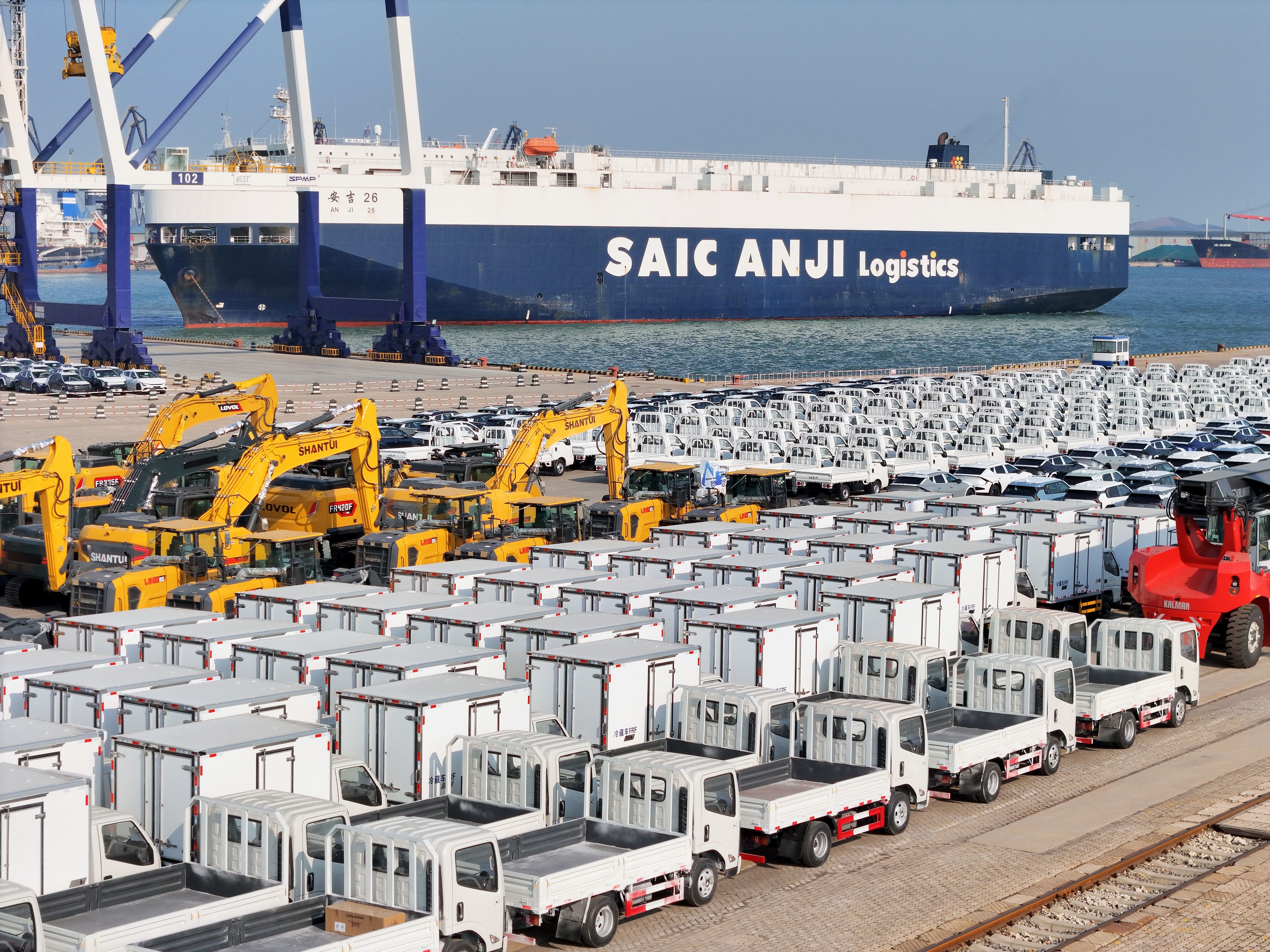 Vehicles are lined up ready for export at a port in eastern China’s Shandong province. China posted a record trade surplus in 2024 as its exports surged in several industries. Photo: Xinhua