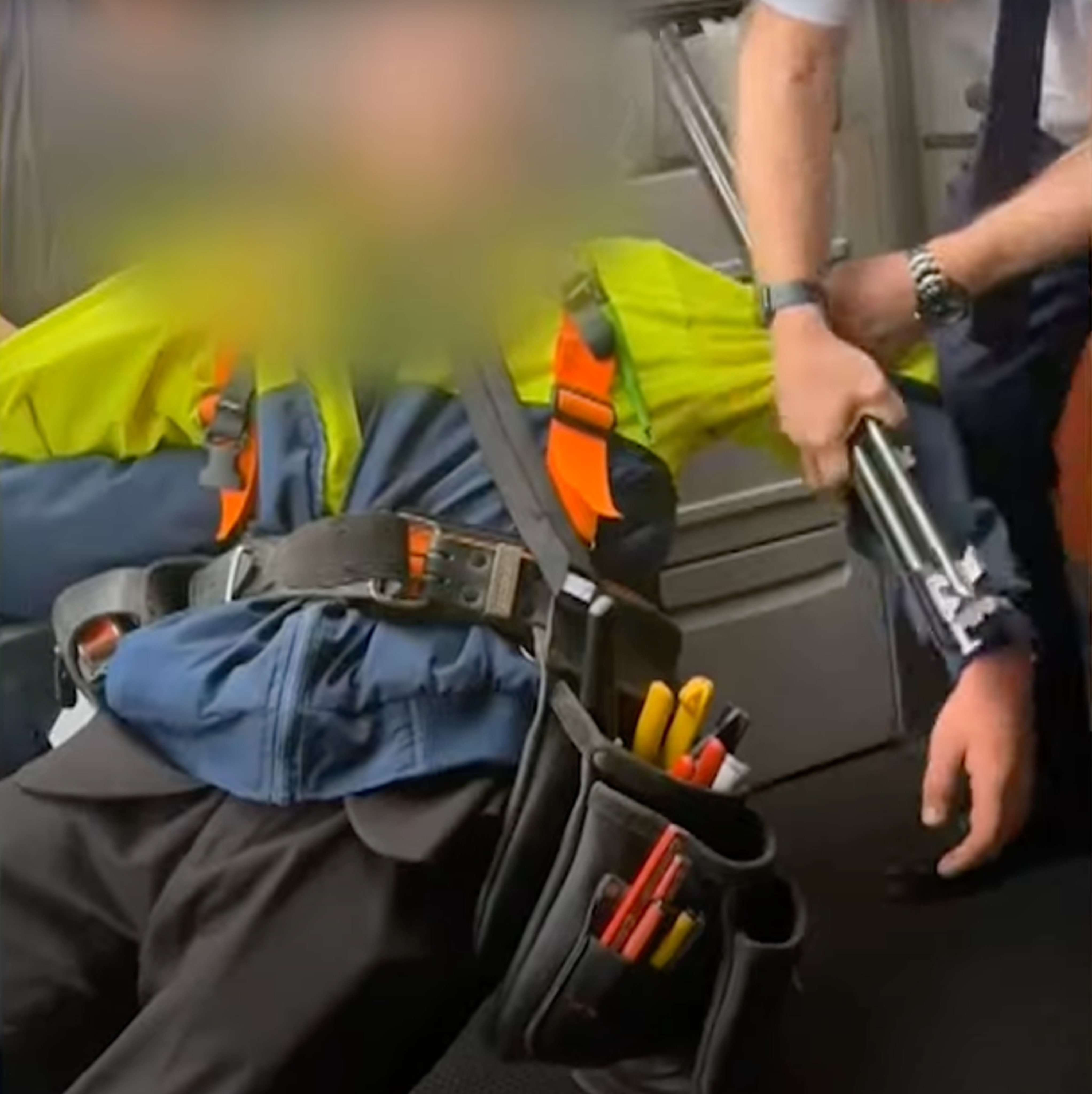A screengrab shows the Australian teen being subdued after trying to sneak on board with a shotgun and ammunition. Photo: 9 News Australia