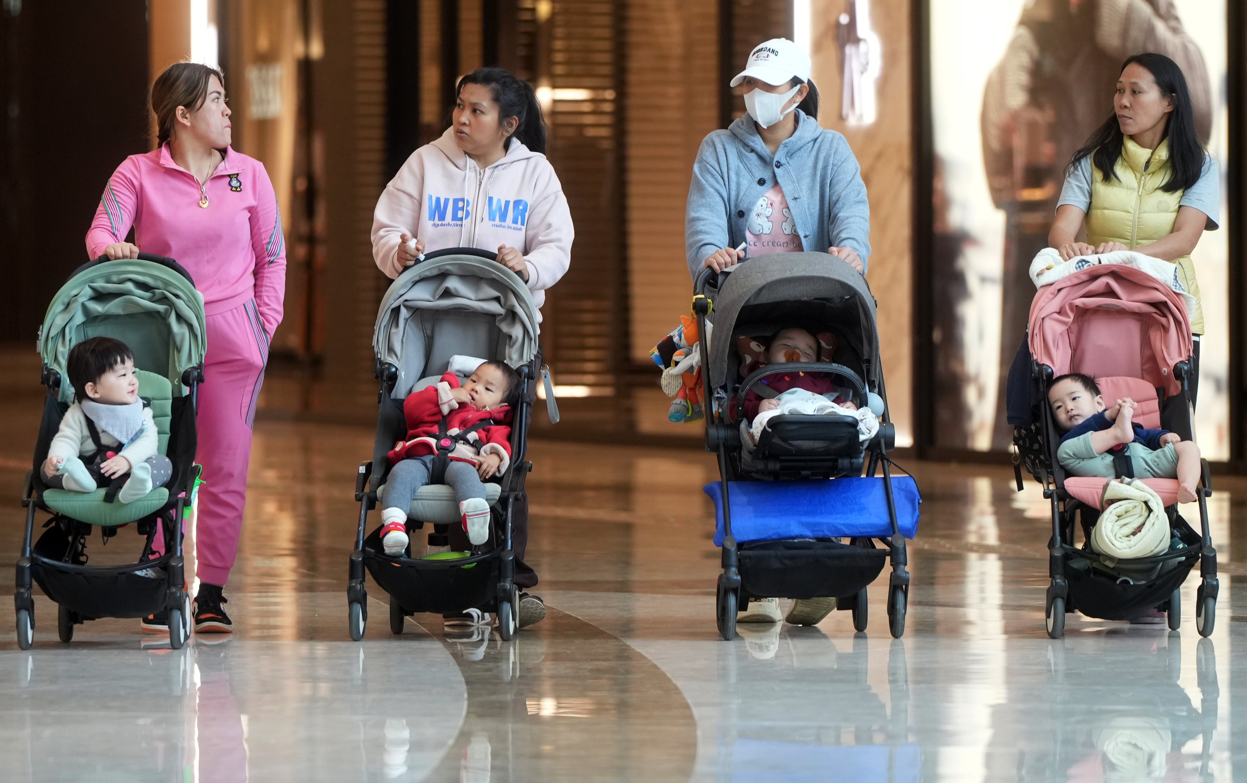 Women walk with babies in Elements, West Kowloon. Photo: Sam Tsang