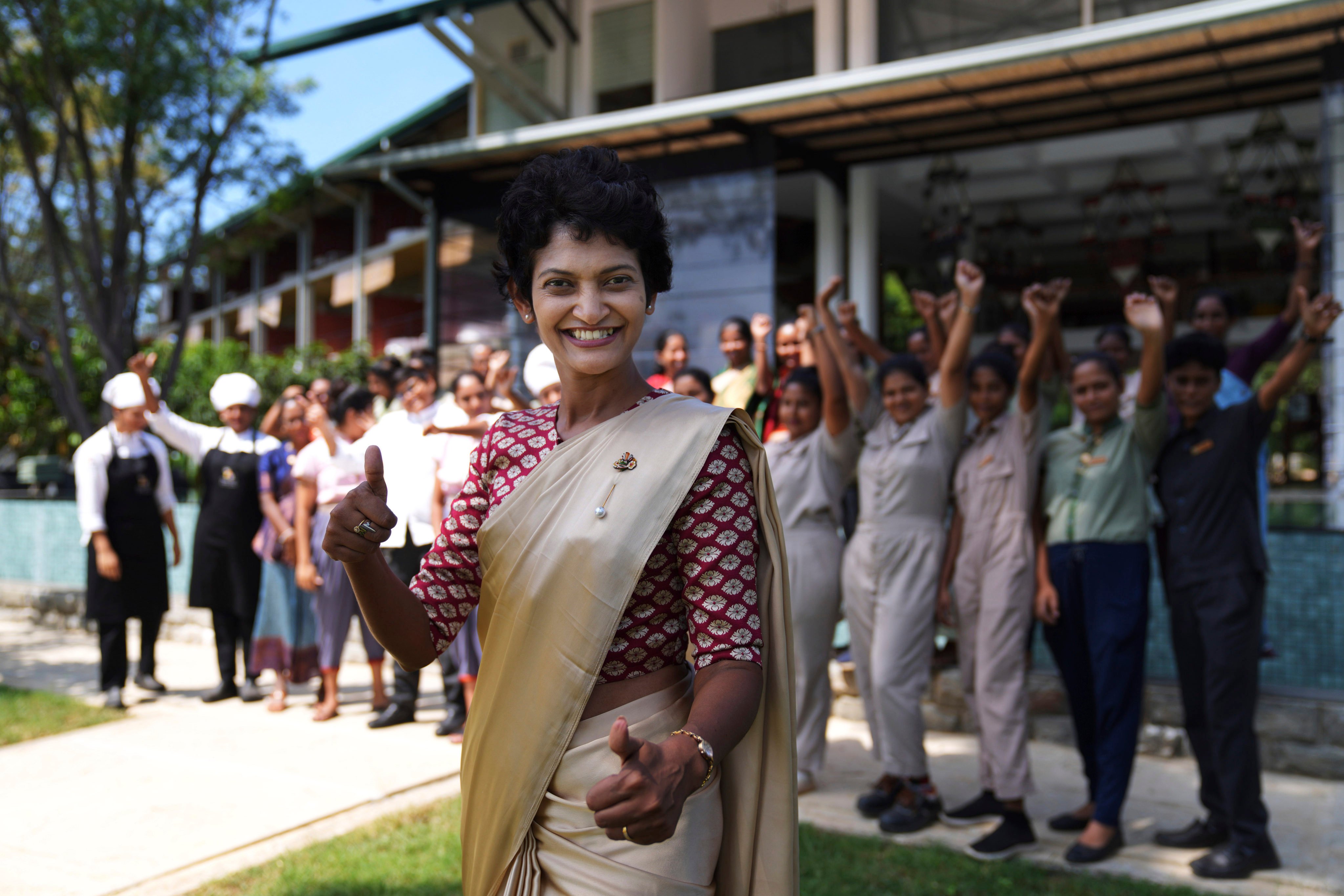 Resort manager Jeewanthi Adikari with her all female staff at Amba Yaalu resort in Dambulla, Sri Lanka, on February 21. Photo: AP