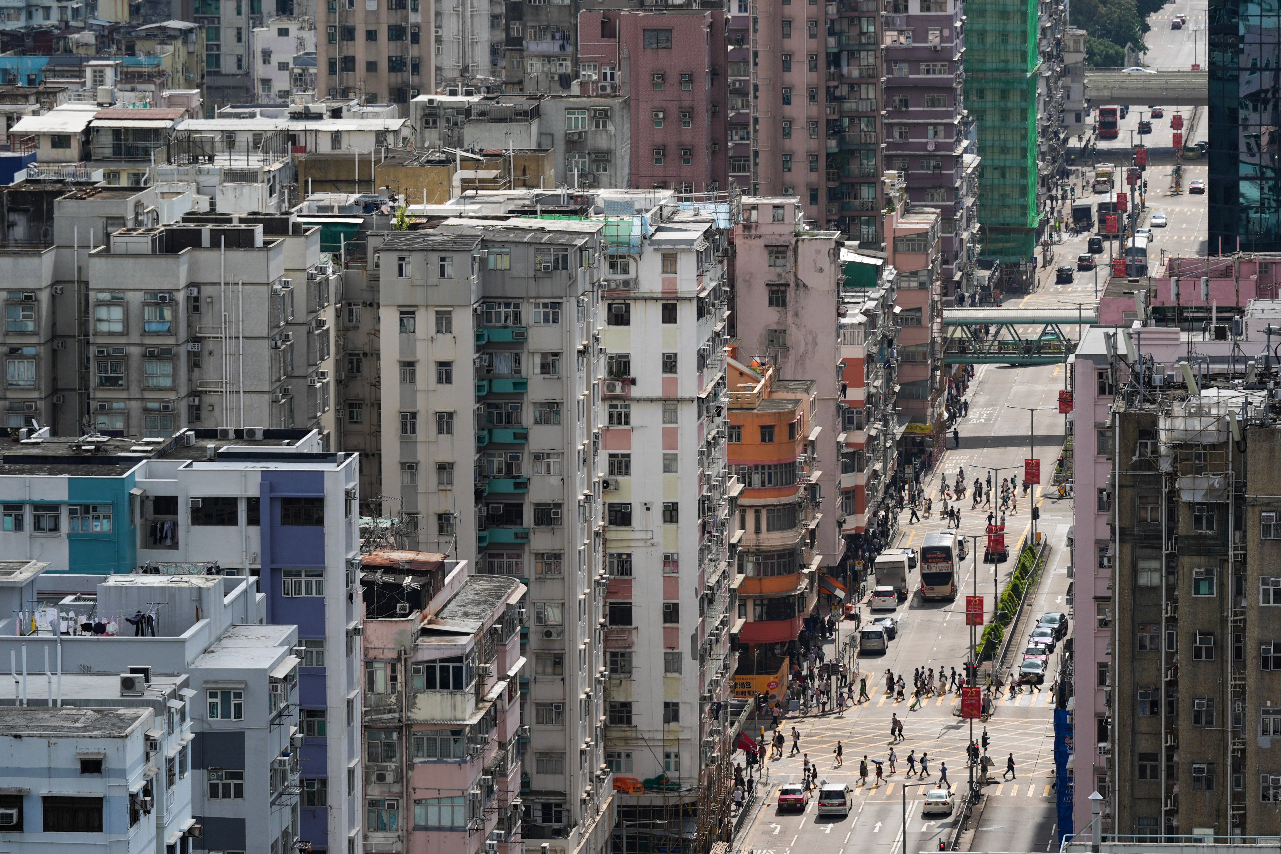 Under the scheme, the same property management company will be hired to provide management services for groups of ageing buildings. Photo: Eugene Lee