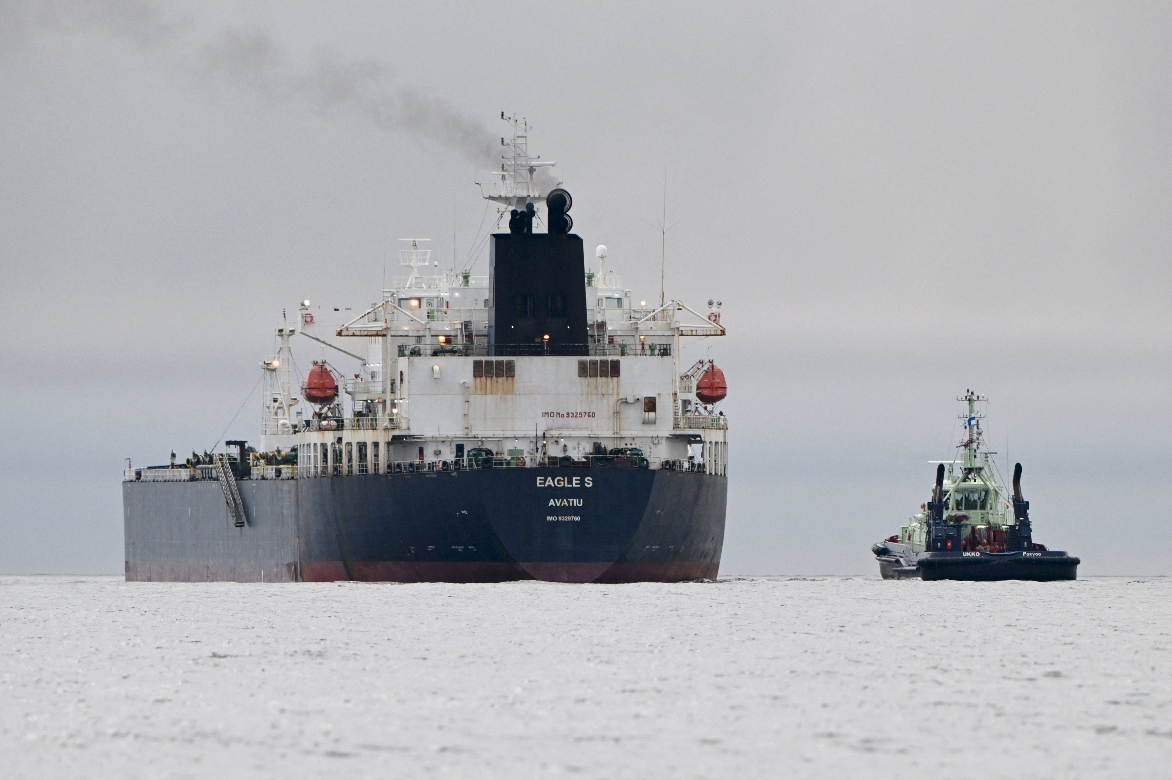 An oil tanker (left) believed to belong to Russia’s shadow fleet transits the Gulf of Finland in 2024. Photo: AFP