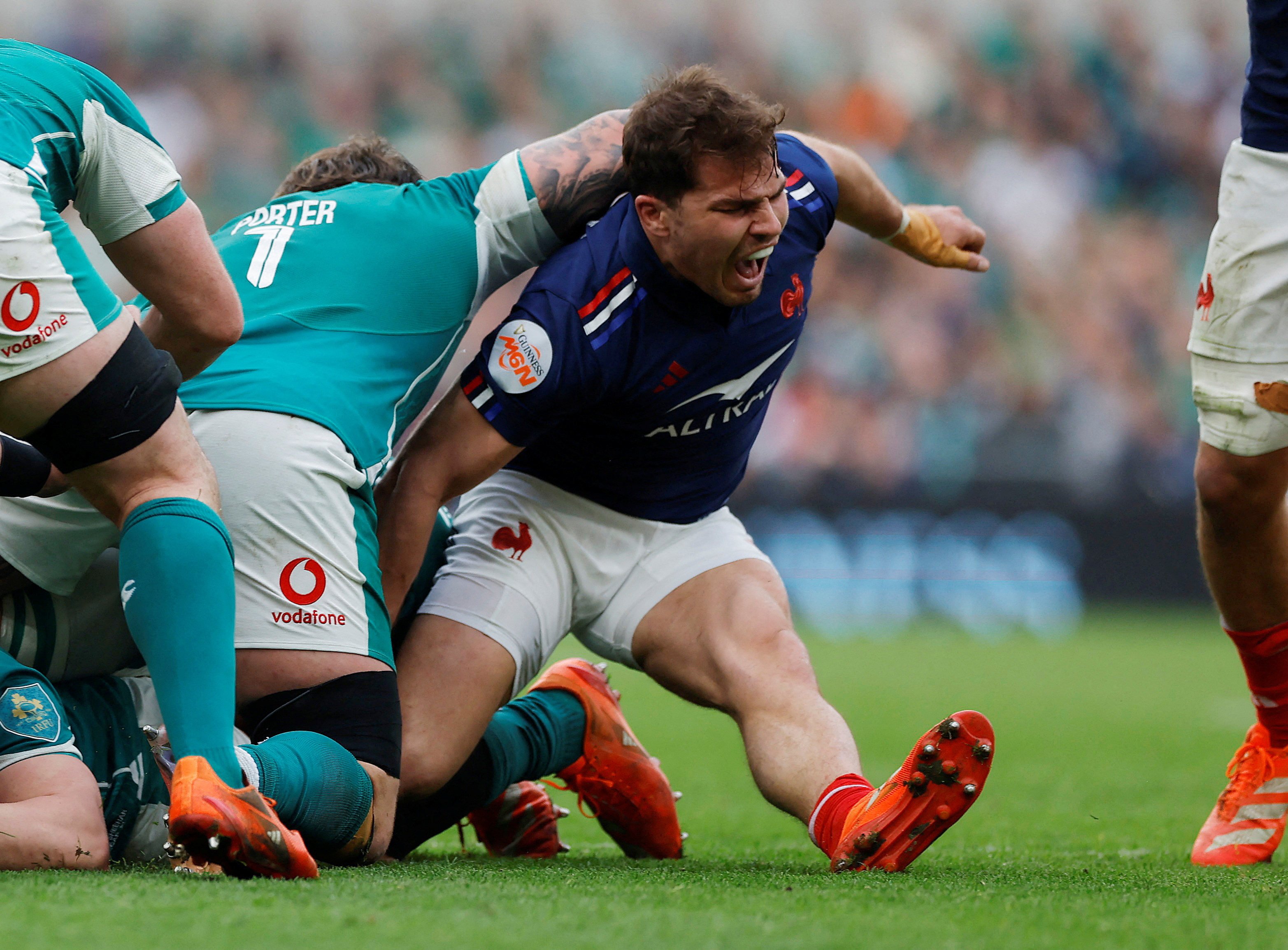 France’s Antoine Dupont cries out as he suffers a knee injury during his side’s win over Ireland. Photo: Reuters