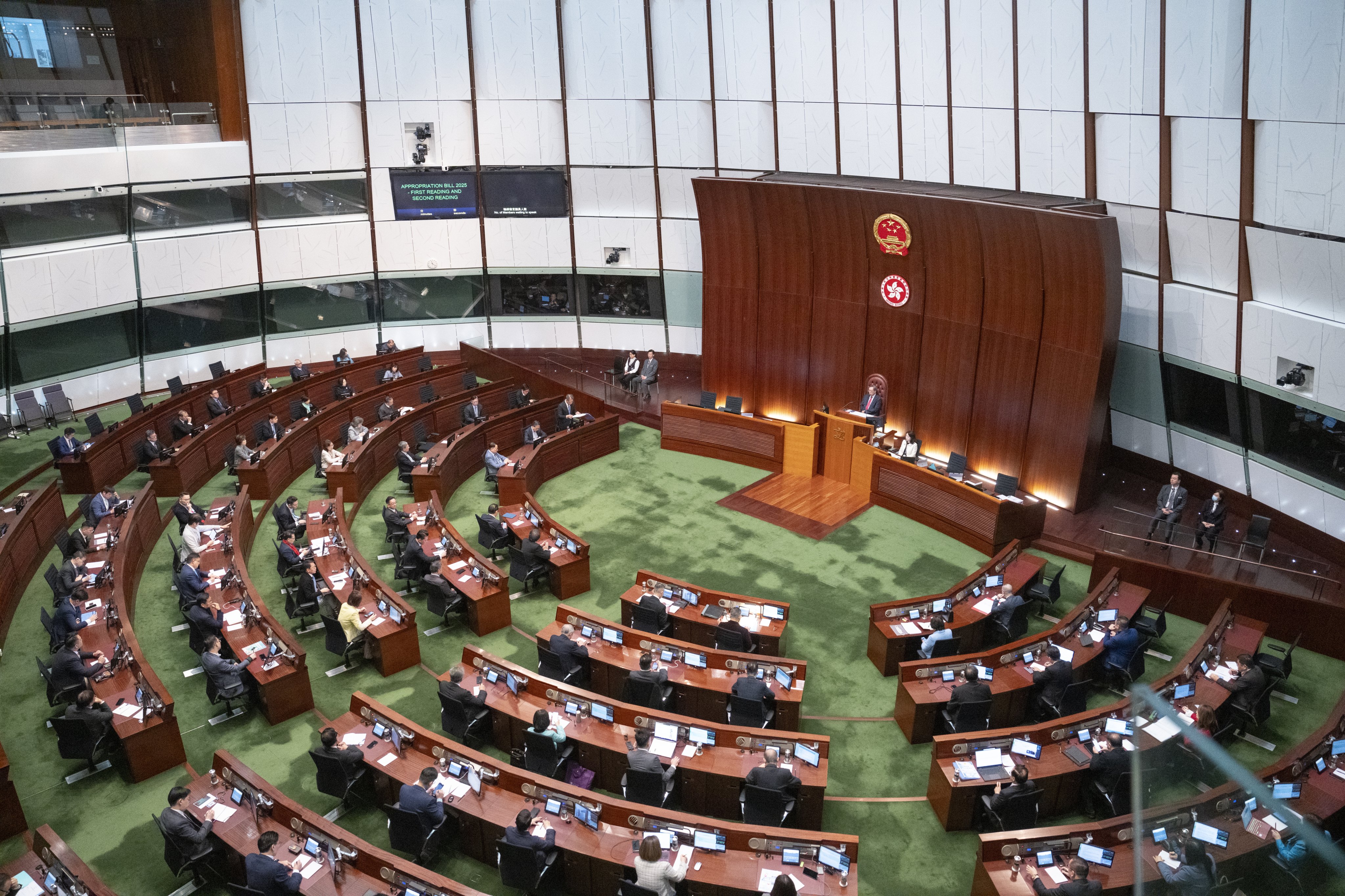 Legislative councillors listen as Financial Secretary Paul Chan Mo-po presents the annual budget for 2025-26 on February 26. Photo: EPA-EFE