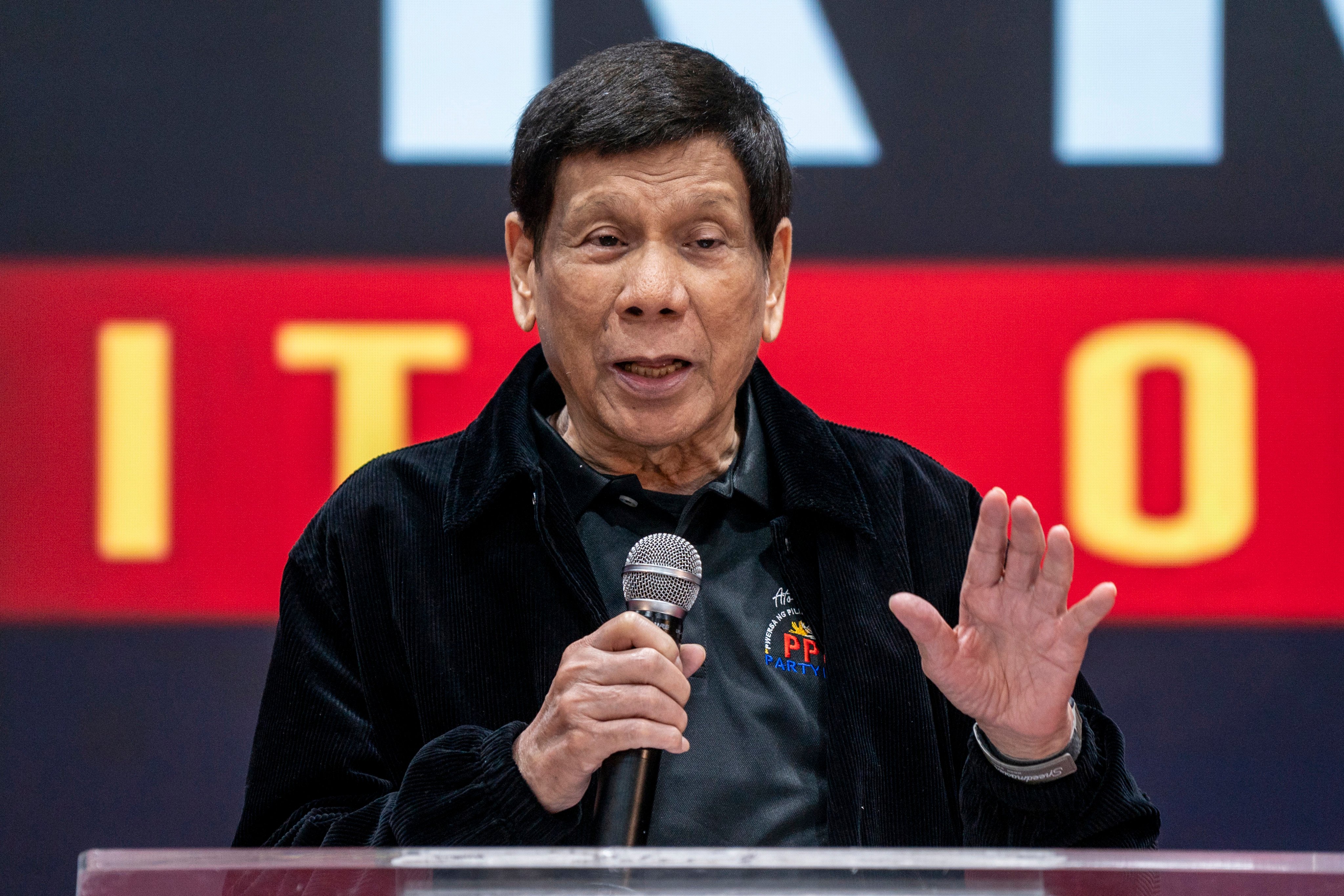 Former president of the Philippines Rodrigo Duterte speaks inside the Southorn Stadium during a thanksgiving gathering organised by Hong Kong-based Filipino workers in Hong Kong on March 9. Photo: AP