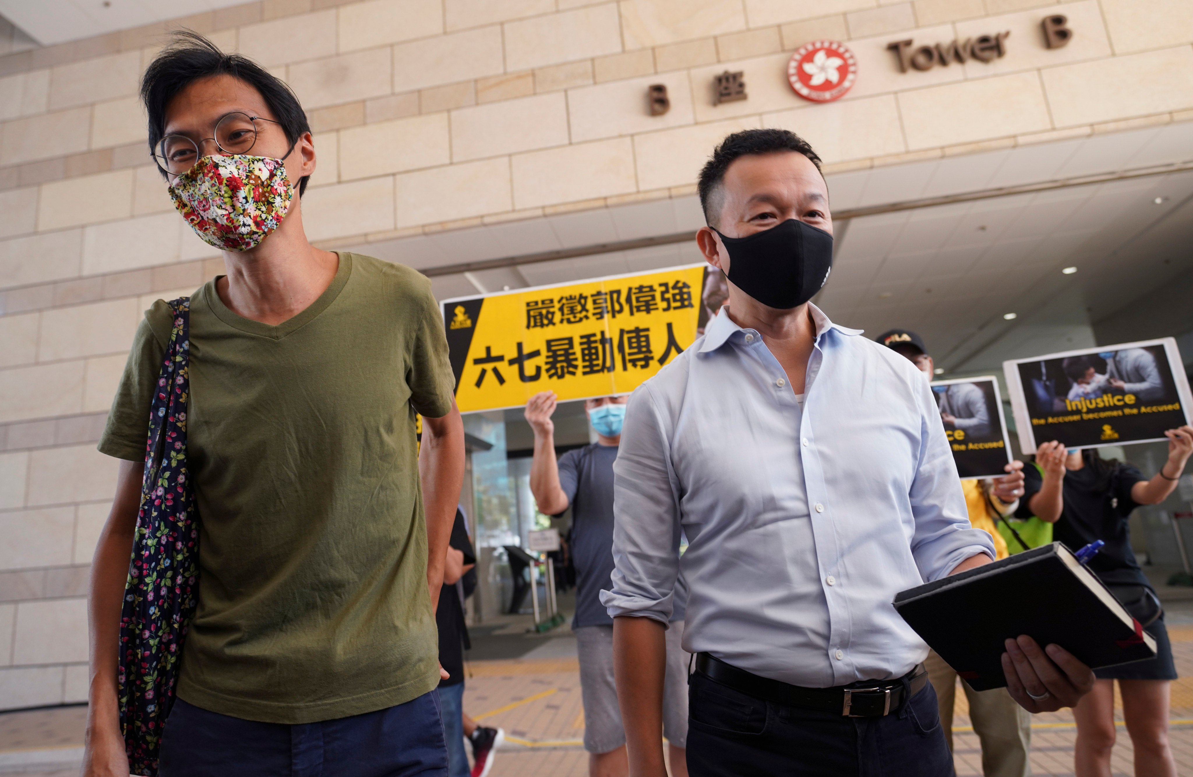 Former opposition lawmakers Eddie Chu, left, and Raymond Chan have been sentenced for their roles in causing a ruckus during a Legislative Council meeting. Photo: Winson Wong