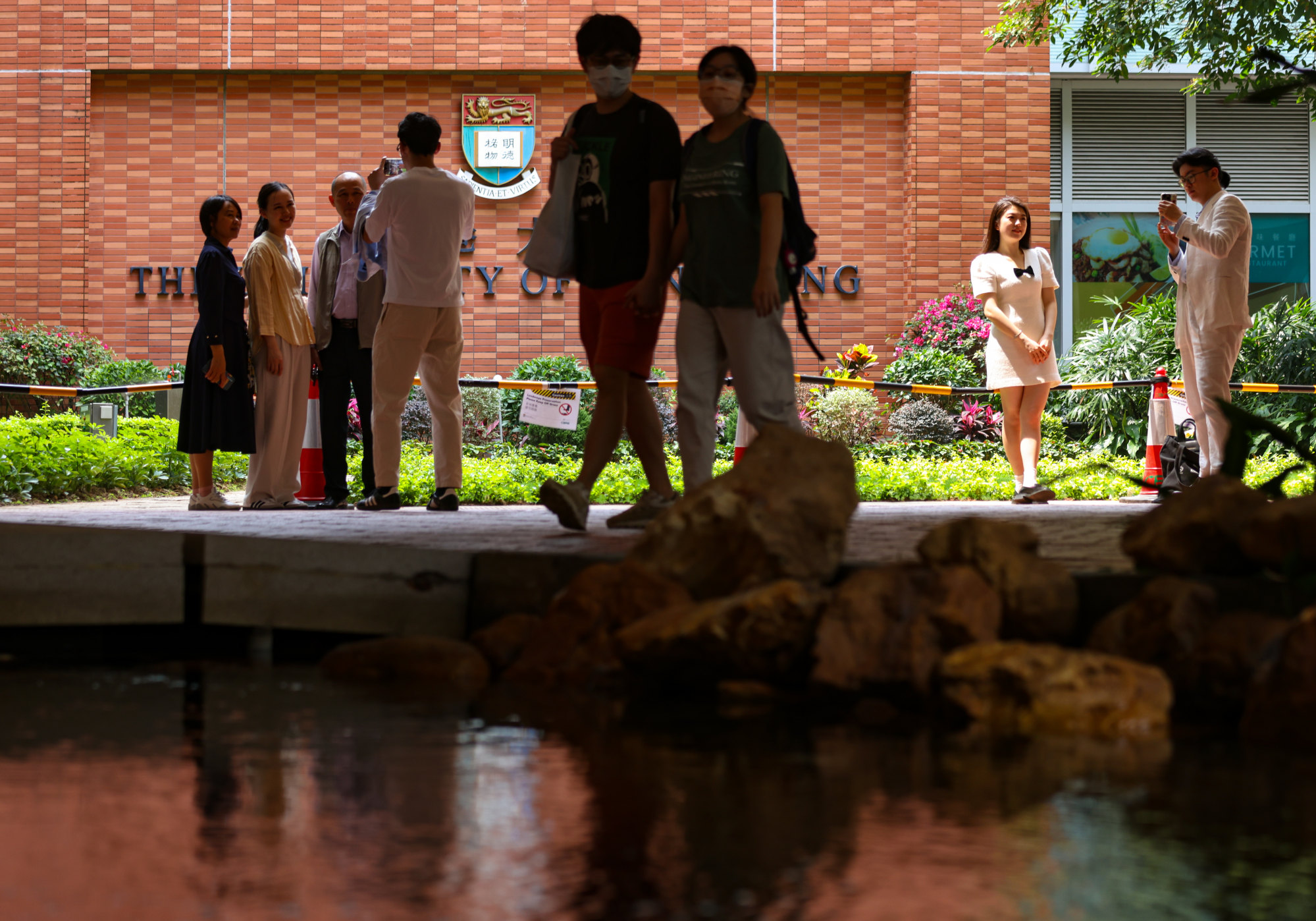 Mainland Chinese tourists take pictures at the University of Hong Kong. Photo: Yik Yeung-man