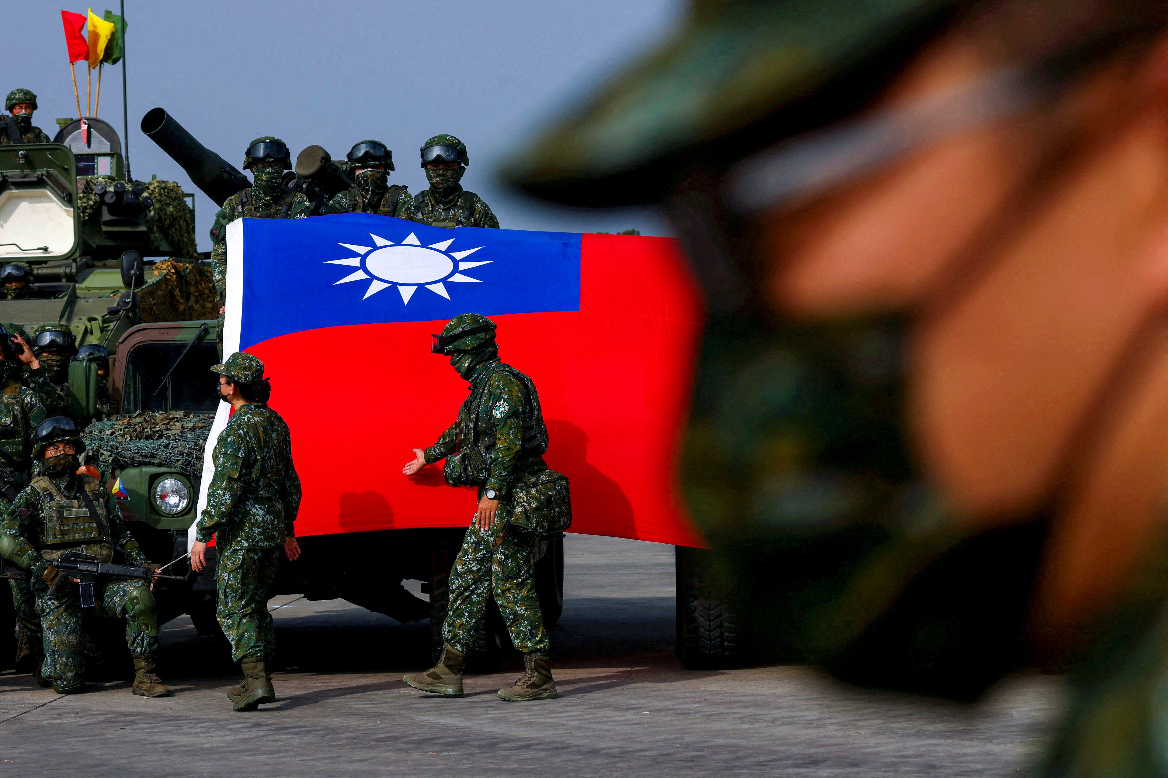 Serving members of the Taiwanese armed forces will be scrutinised more closely for connections to the Chinese mainland if a draft legal amendment is approved. Photo: Reuters