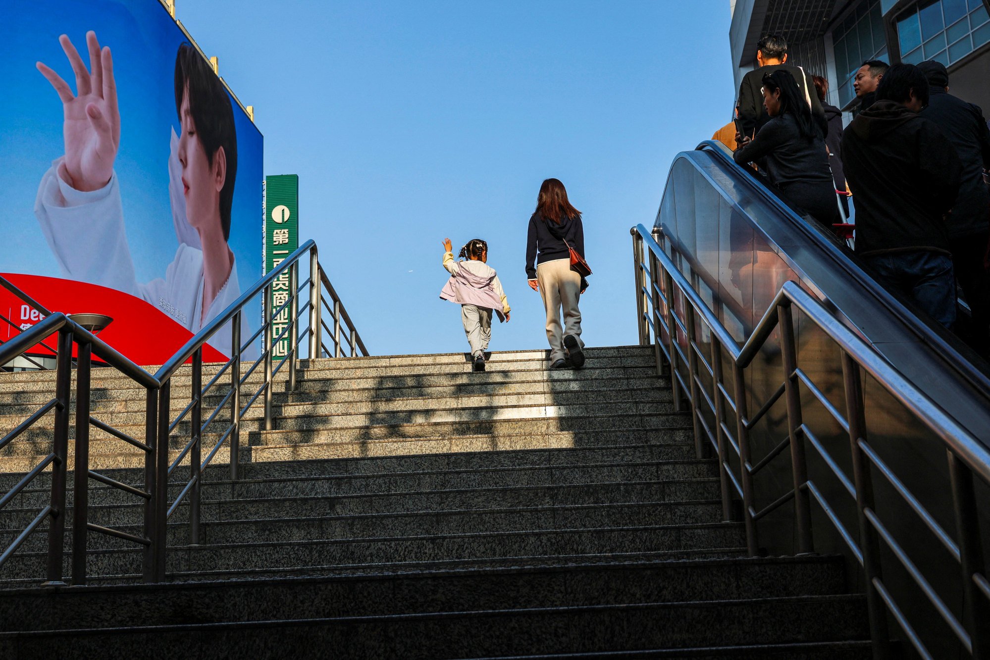 Women are still bearing most of the responsibility for childcare in China. Photo: Reuters