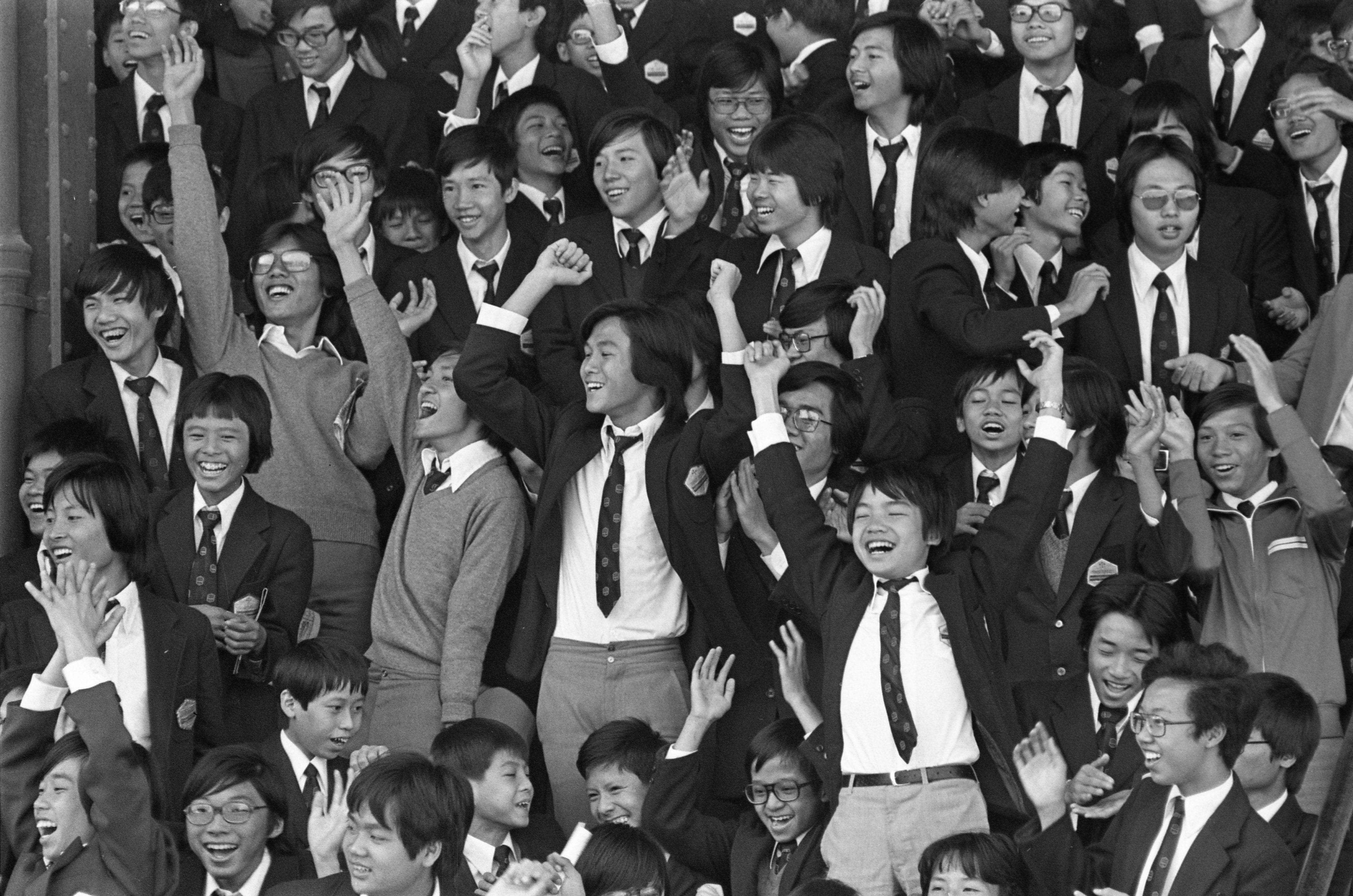 Students of Diocesan Boy’s School cheer their classmates during the school’s sports day at the South China Athletic Association Stadium in Happy Valley in 1977. Photo: SCMP