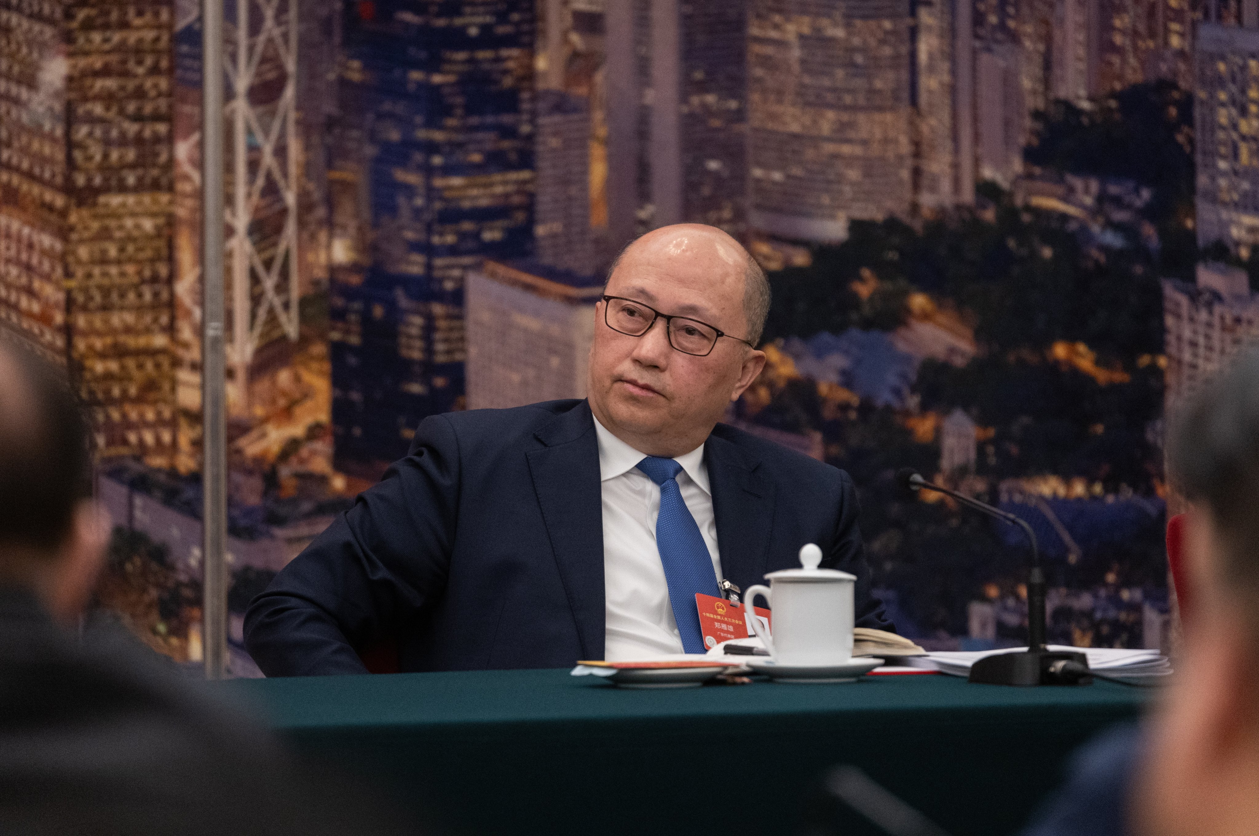 Zheng Yanxiong, director of the Hong Kong Liaison Office, attends the Hong Kong delegation group meeting at The Third Session of the 14th National People’s Congress of China in Beijing on March 7. Photo: EPA-EFE