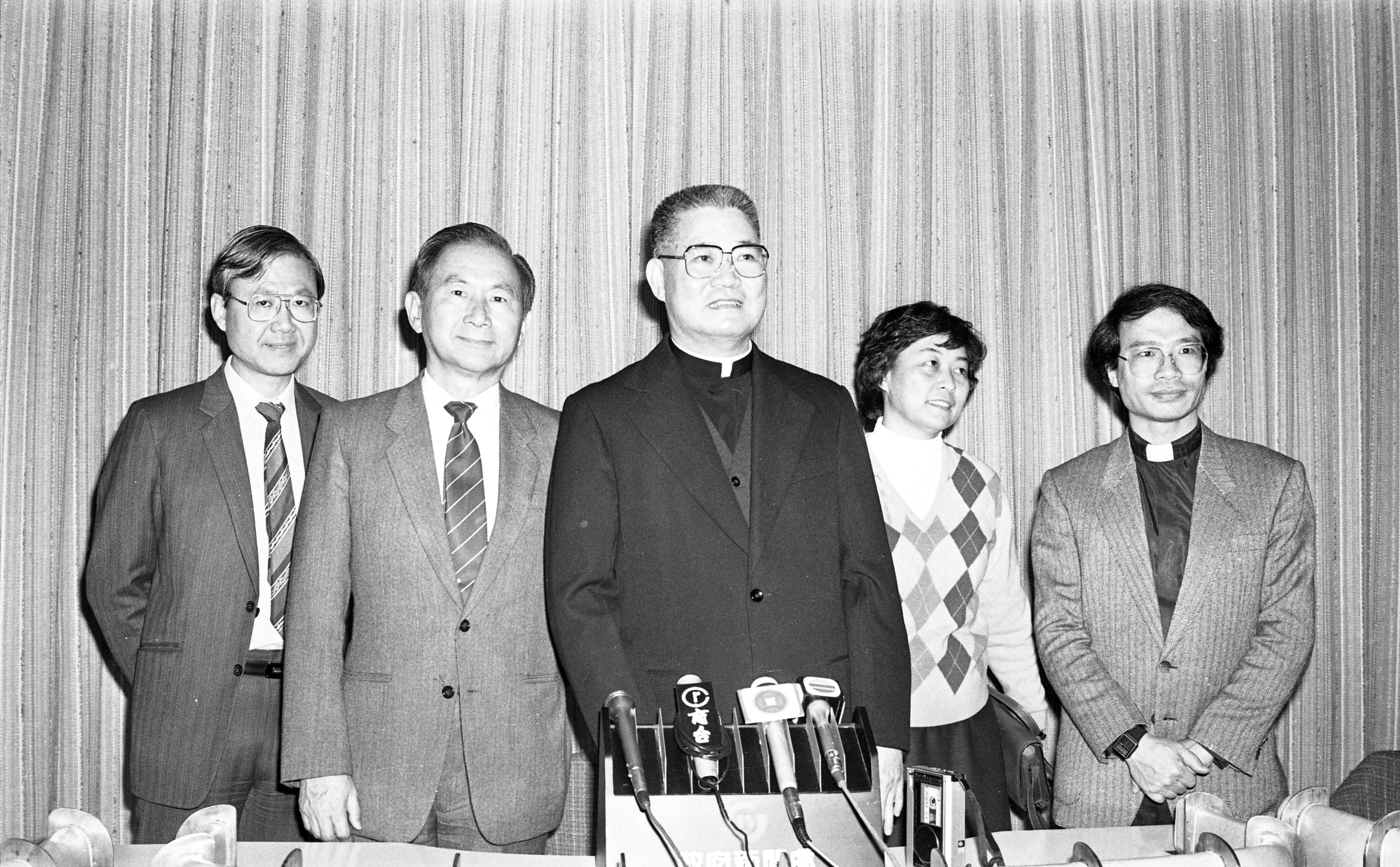 The Catholic Bishop of Hong Kong, the Most Rev John Baptist Wu (centre), heading a delegation to China, at a press conference in Kai Tak Airport in March 1985. Photo: P.Y. Tang