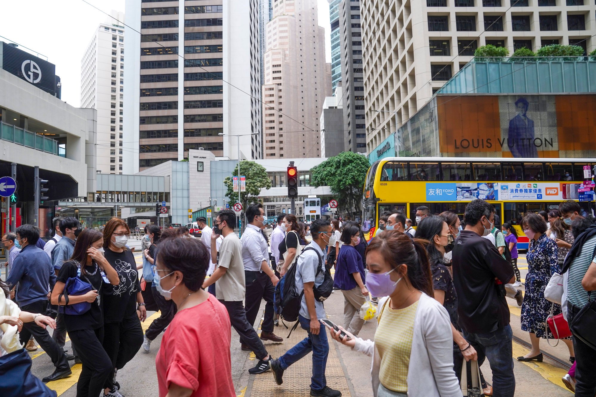 People crossing a street in Central, Hong Kong. Photo: Sam Tsang People crossing a street in Central, Hong Kong. Photo: Sam Tsang