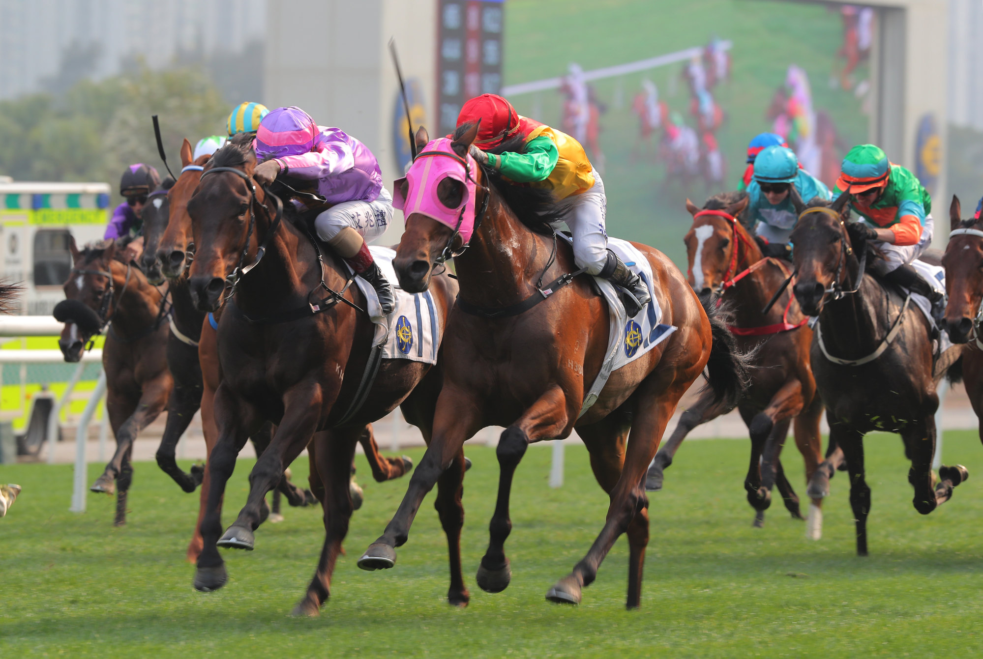Johannes Brahms gets up on the inside of Speed Dragon to win at Sha Tin.