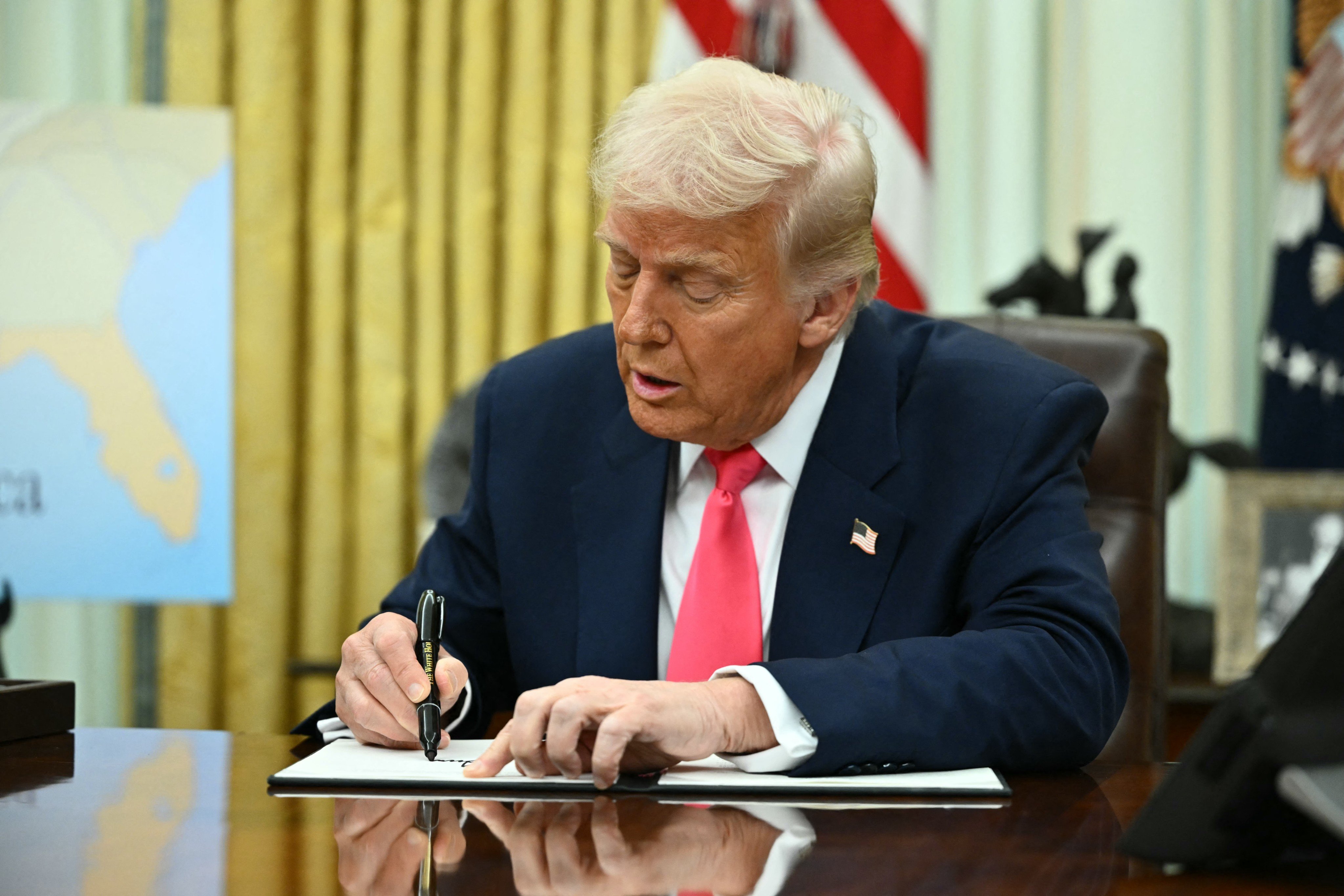 US President Donald Trump signed an executive order in March making English the official language of the country. Photo: AFP