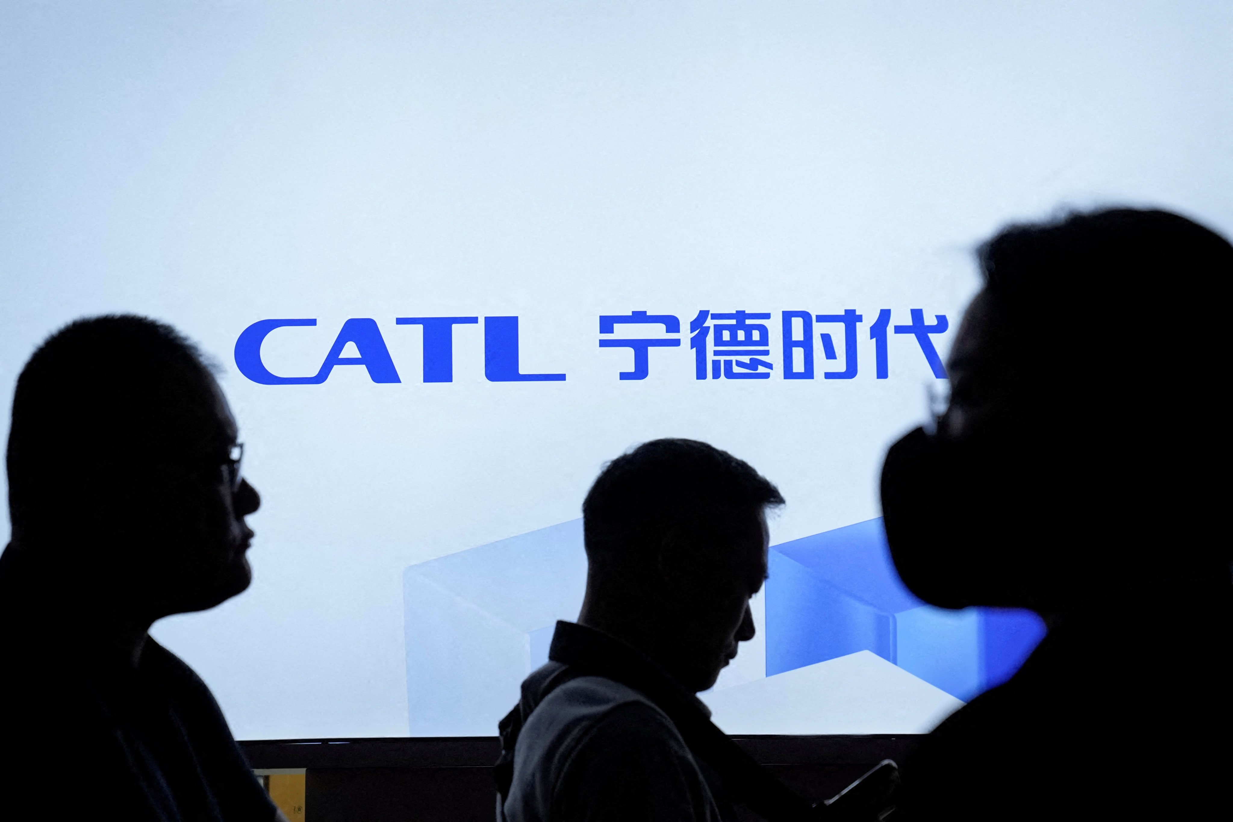 People passed a CATL logo at an auto show in Shanghai. Photo: Reuters