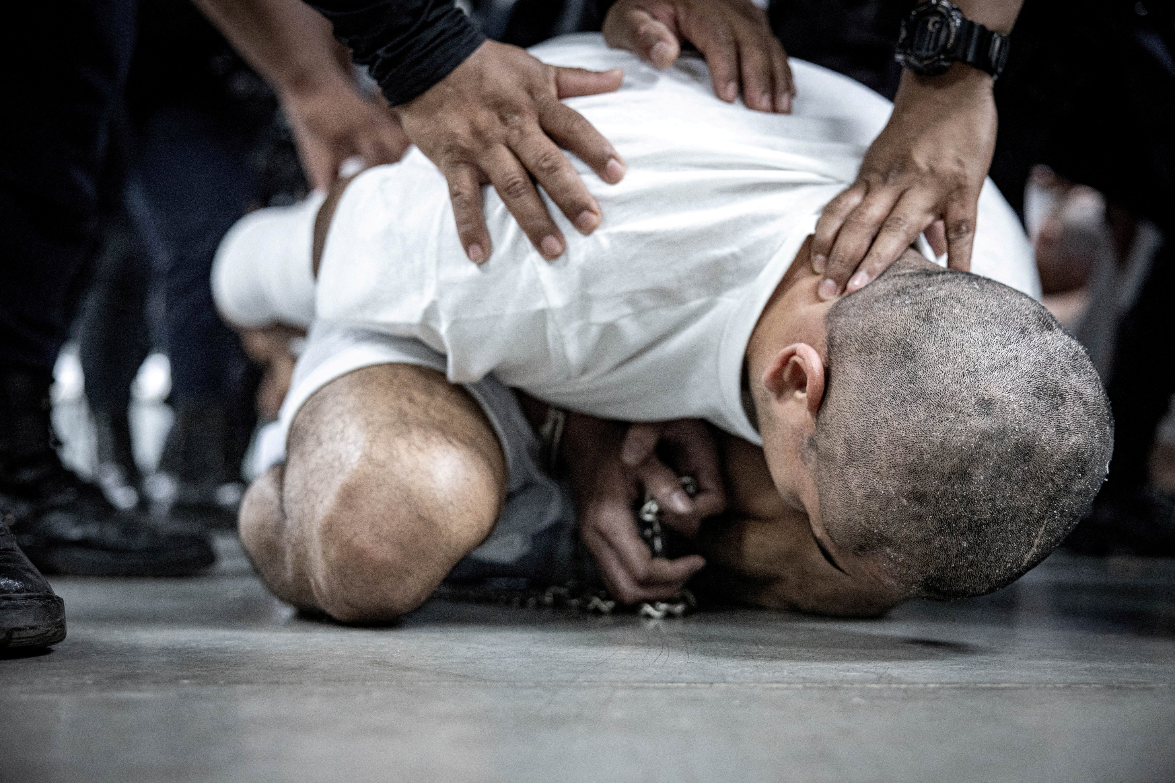 An alleged Venezuelan gang member who was deported to  El Salvador by the US. Photo: Secretaria de Prensa de la Presidencia via Reuters