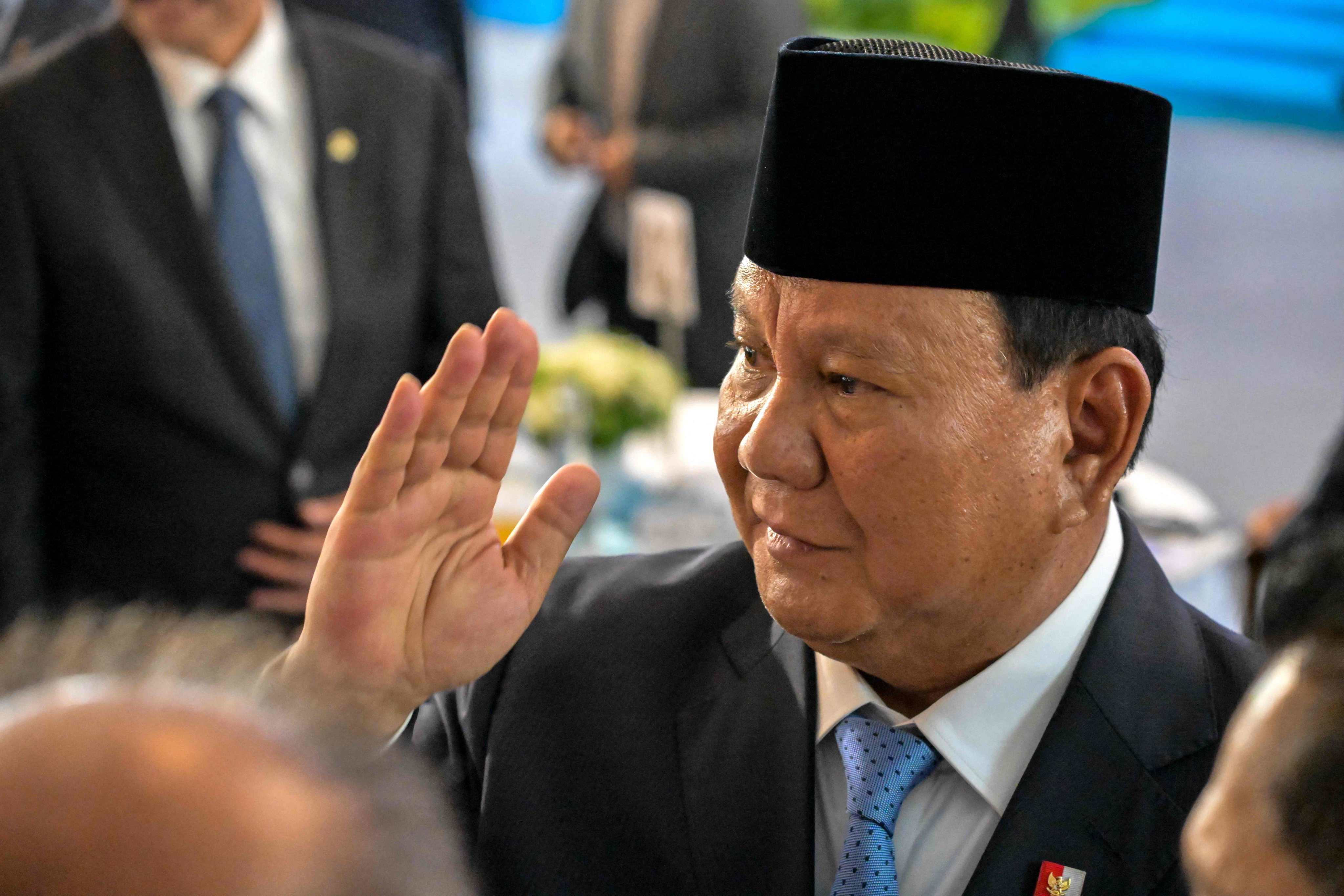 Indonesian President Prabowo Subianto greets guests at an event in Jakarta last month. Photo: AFP