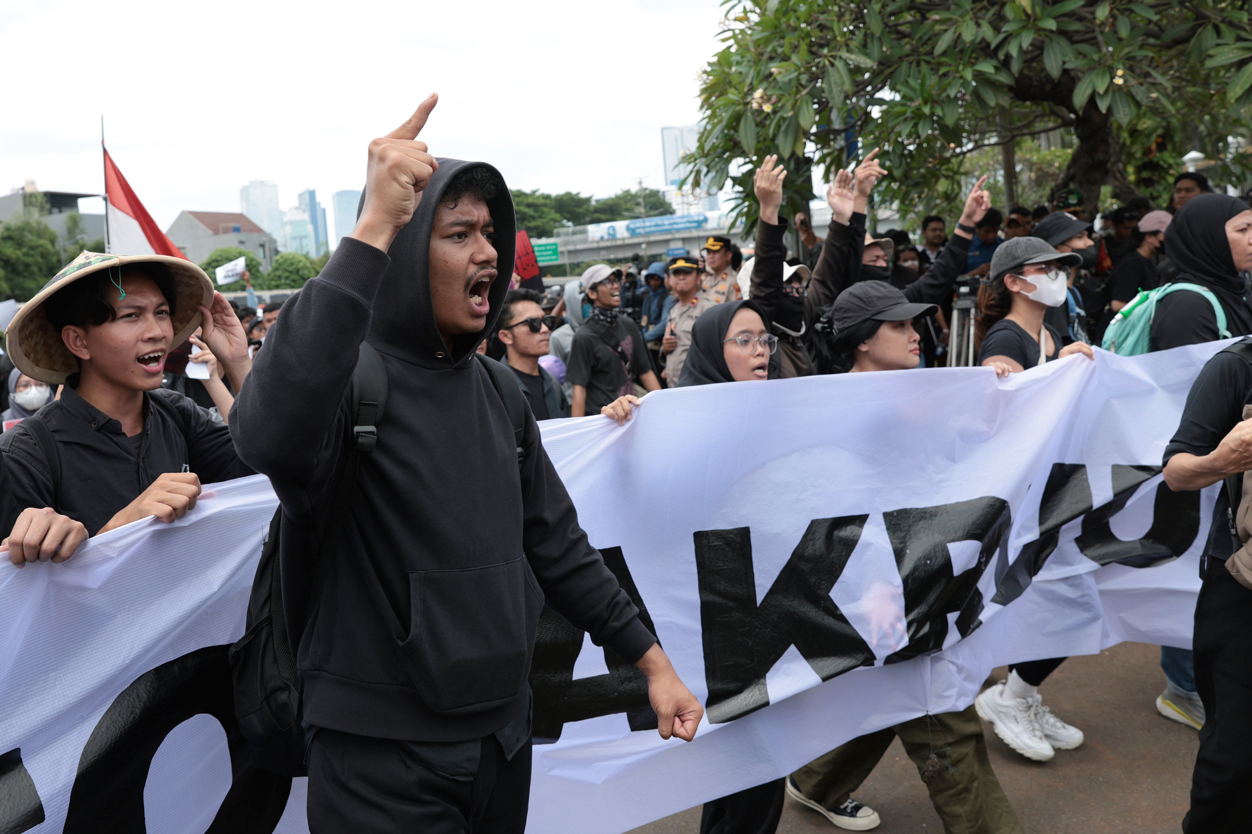 Indonesian student activists protest against the revision of the country’s military law in front of the Parliament building in Jakarta. Photo: EPA-EFE