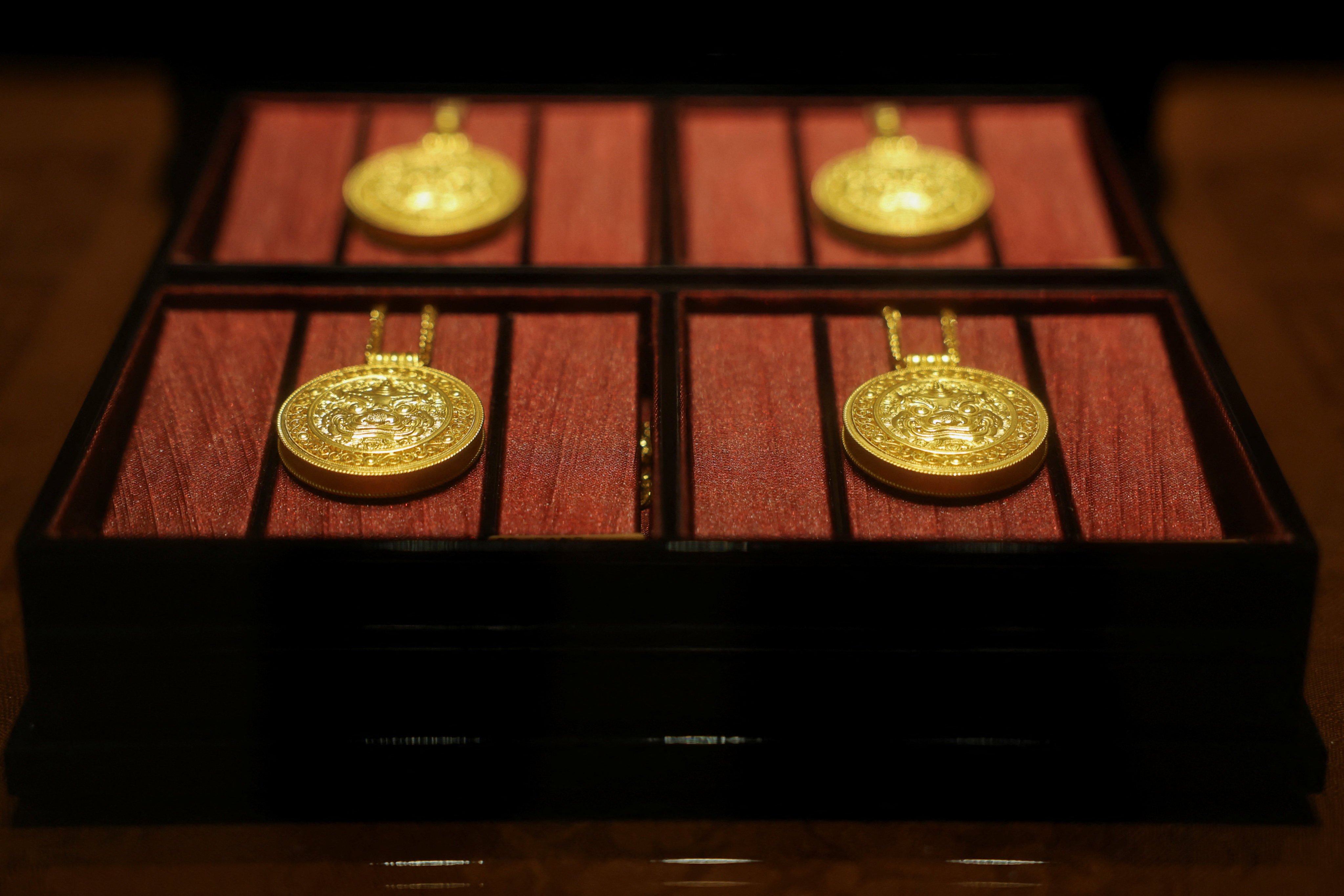 Gold necklaces sit in a display case at a Laopu Gold jewellery store in Beijing. Chinese jewellers have struggled to threaten global luxury players – until now. Photo: Reuters