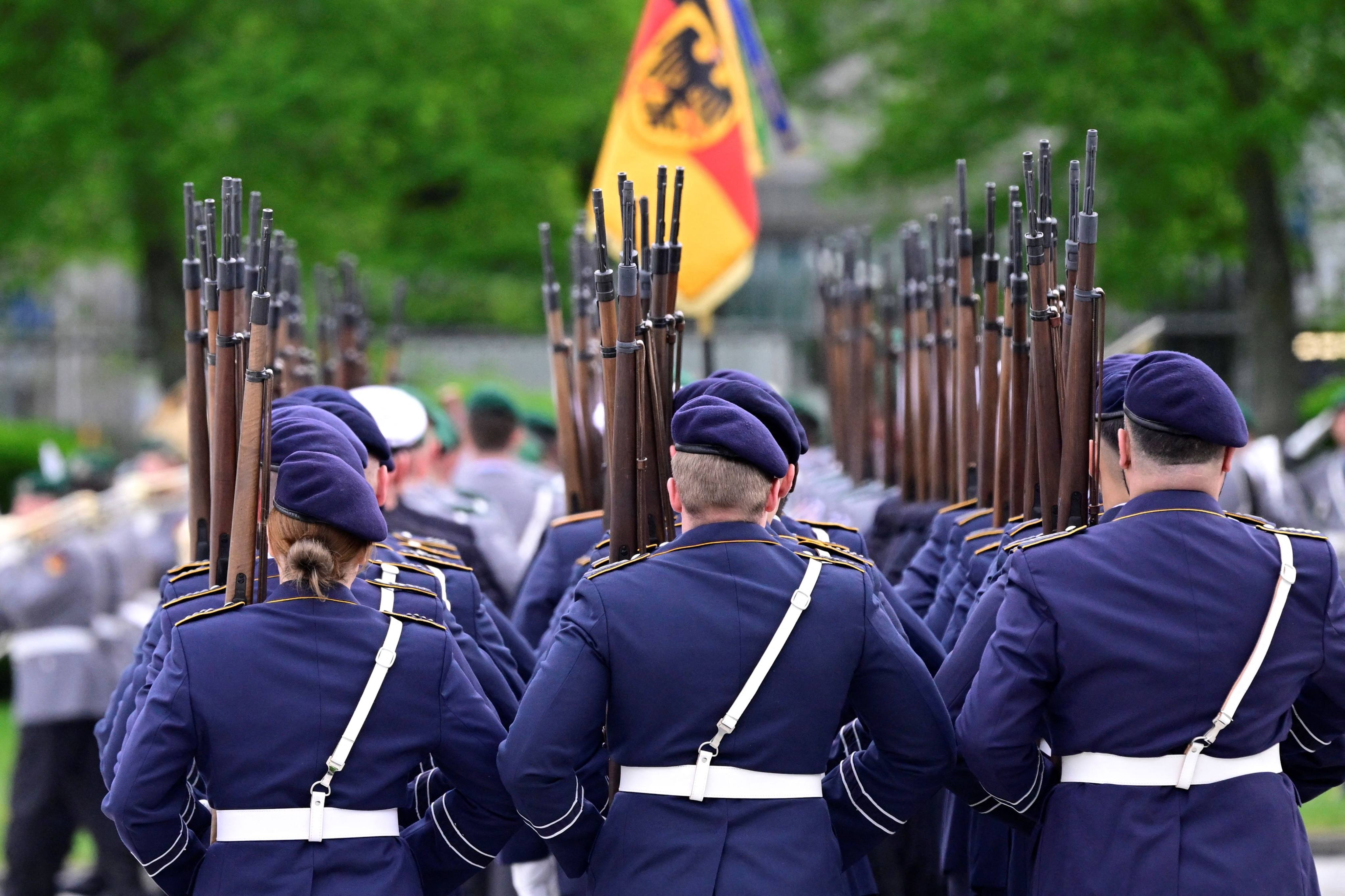 An honour guard of the German armed forces Bundeswehr marches during a ceremony in honour of soldiers deployed to Mali, in front of the German Ministry of Defence in Berlin in 2024. Germany’s incoming chancellor Friedrich Merz is set to oversee a spending surge to boost German infrastructure and its armed forces. Photo: AFP