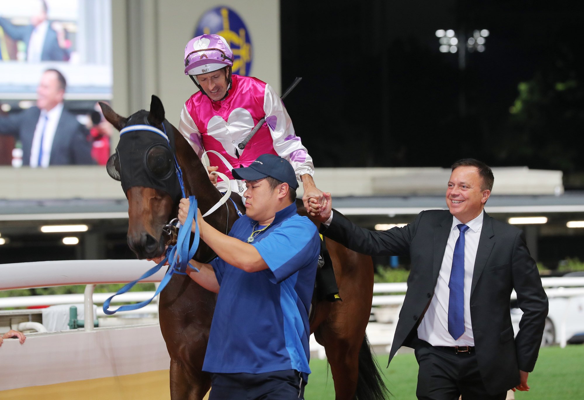 Jockey Hugh Bowman and trainer Caspar Fownes celebrate after M Unicorn’s latest success.