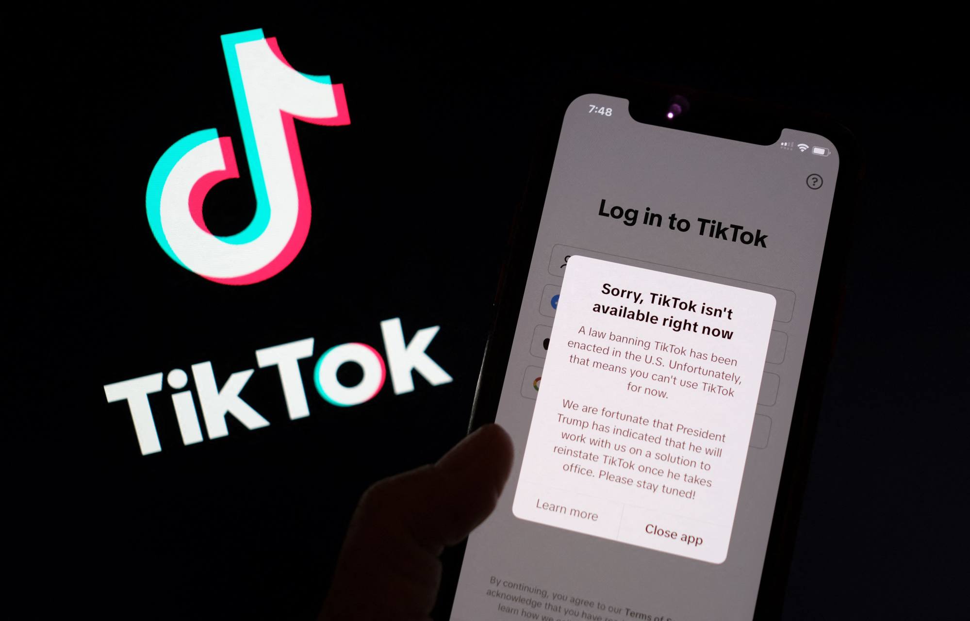 This illustration photo taken on January 18, 2025 shows the TikTok app on a smartphone screen in front of the TikTok logo. Photo: AFP This illustration photo taken on January 18, 2025 shows the TikTok app on a smartphone screen in front of the TikTok logo. Photo: AFP
