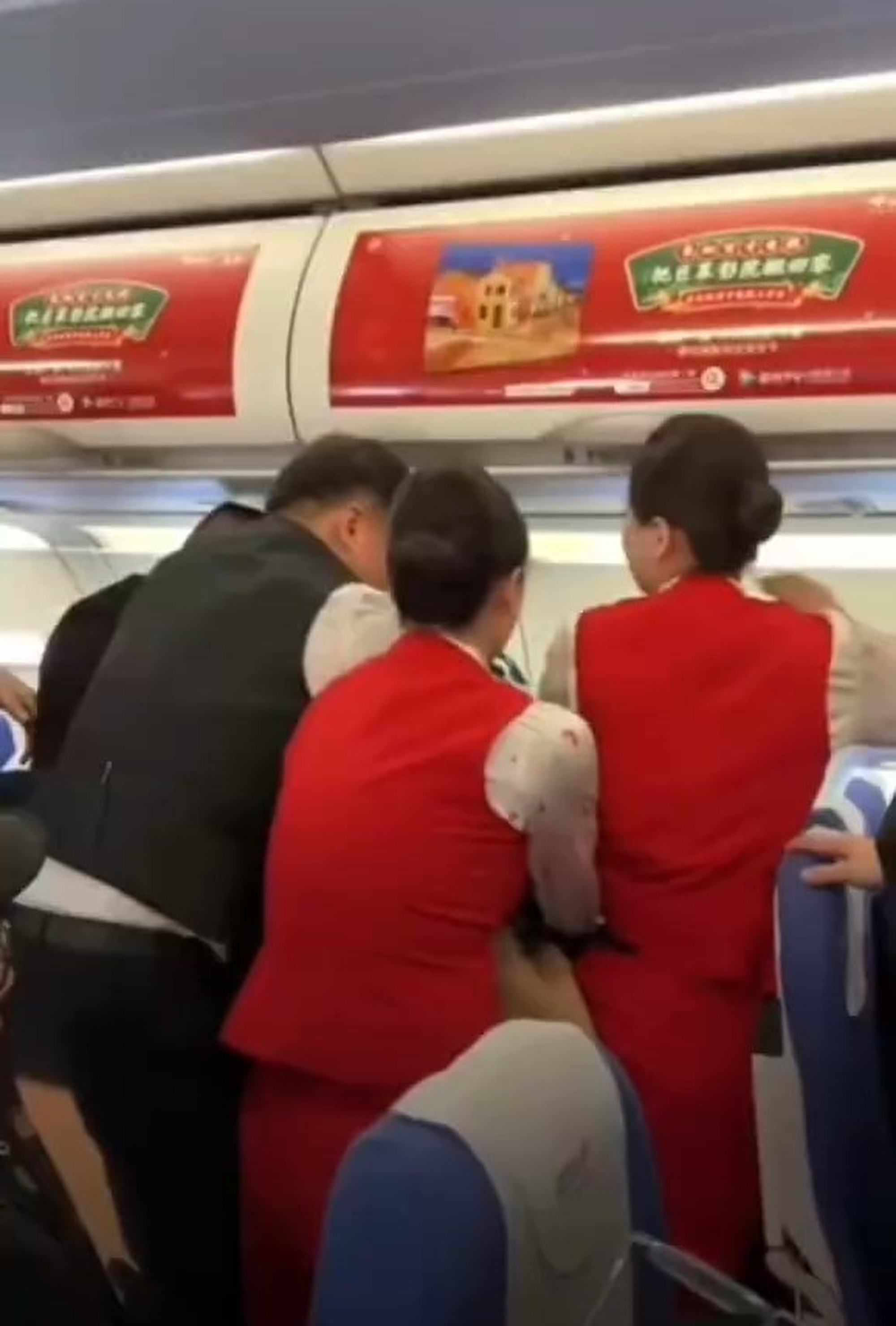 After the flight attendants intervened, police took the two women passengers off the aircraft. Photo: Weibo